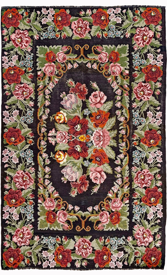 Vintage Moldovan rose floral kilim rug, 8x13, with black-brown field and large floral bouquet design in pink, red, sage, lavender, and sky blue tones.