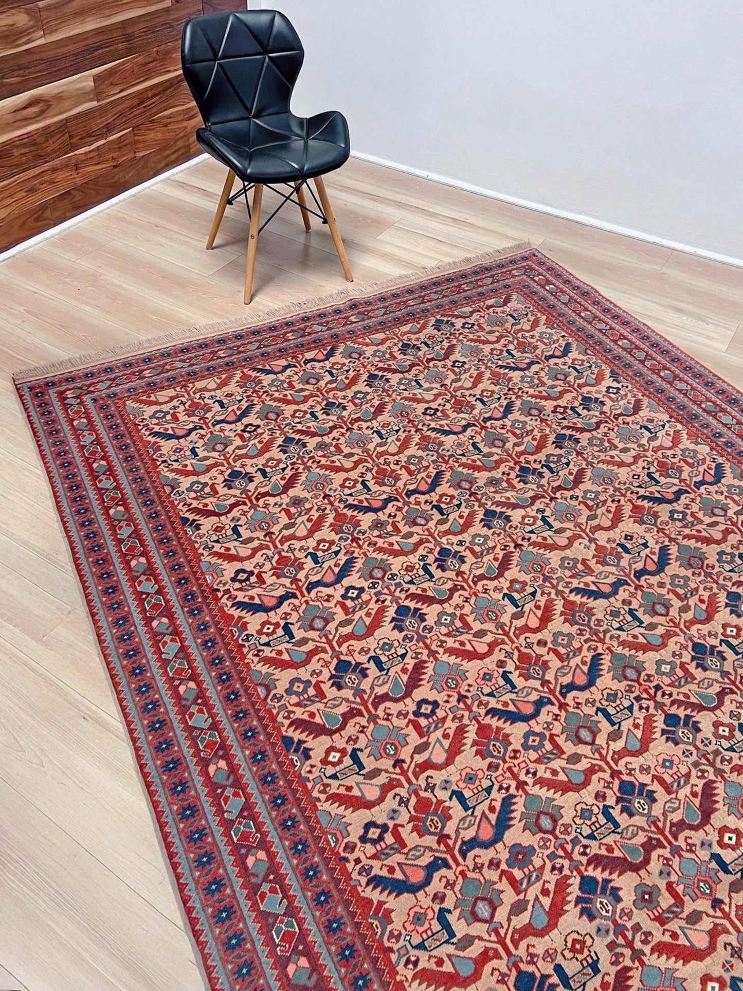Brand new 6x9 handmade Turkish Tree of Life rug in muted peach with birds, floral motifs, coral red and blue accents, traditional wool area rug from Indigo Rugs Burlingame Bay Area.