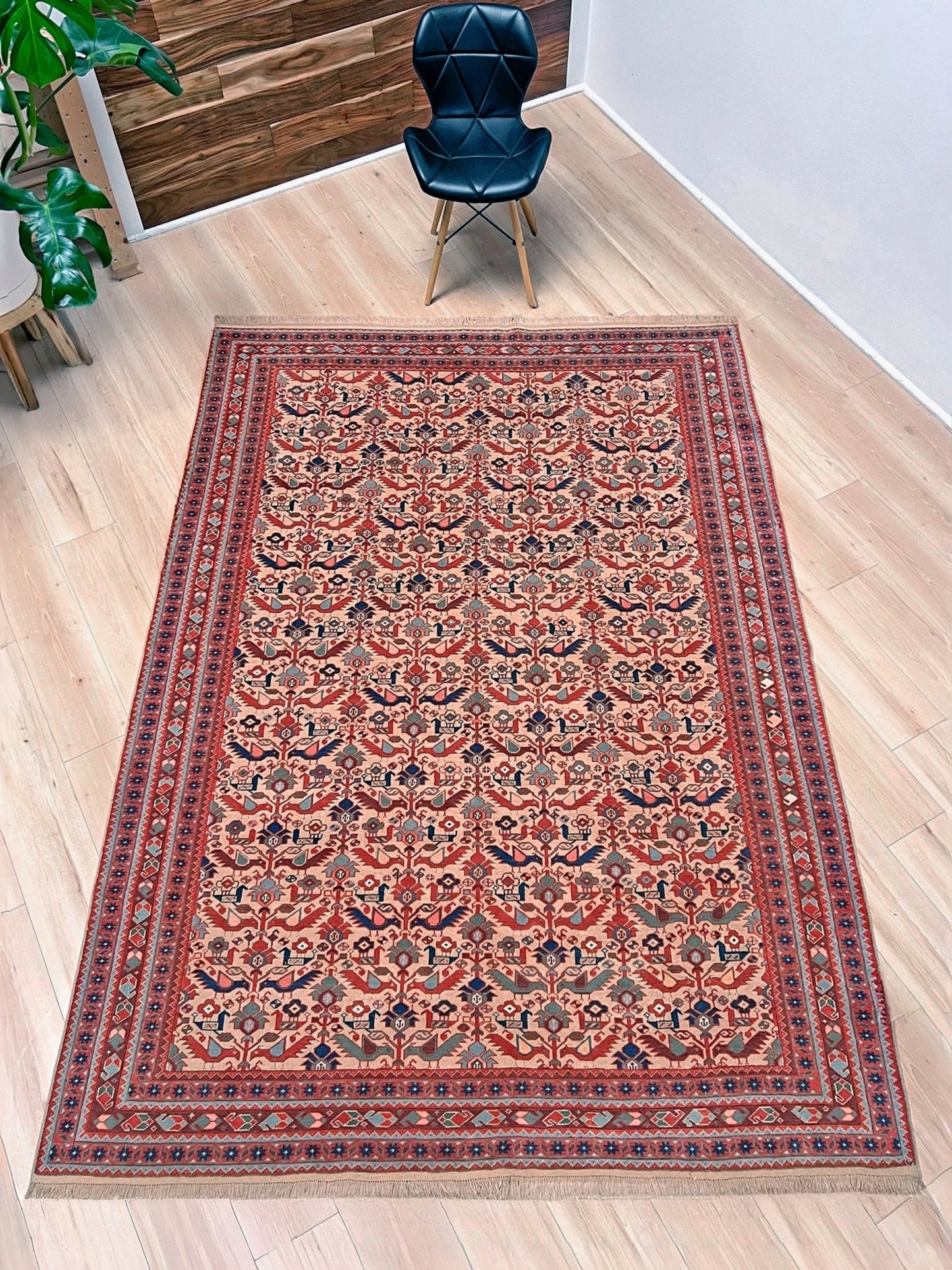 Brand new 6x9 handmade Turkish Tree of Life rug in pale salmon pink with birds, floral motifs, coral red and blue accents, traditional wool area rug from Indigo Rugs Burlingame Bay Area.