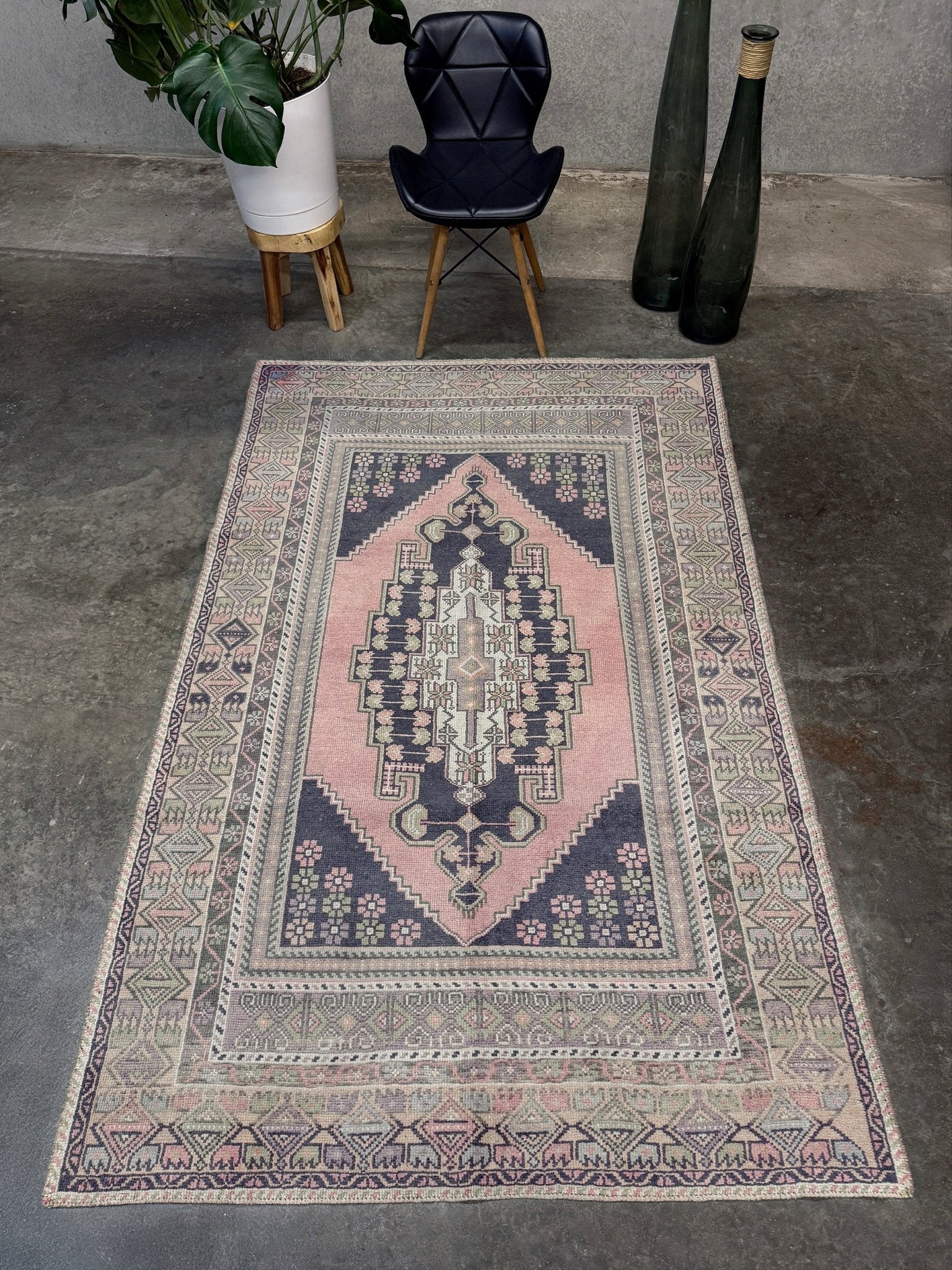 pastel vintage turkish obruk rug 4x7 handwoven anatolian wool rug dusty rose field charcoal navy medallion floral border low pile vintage rug indigo rugs san francisco bay area