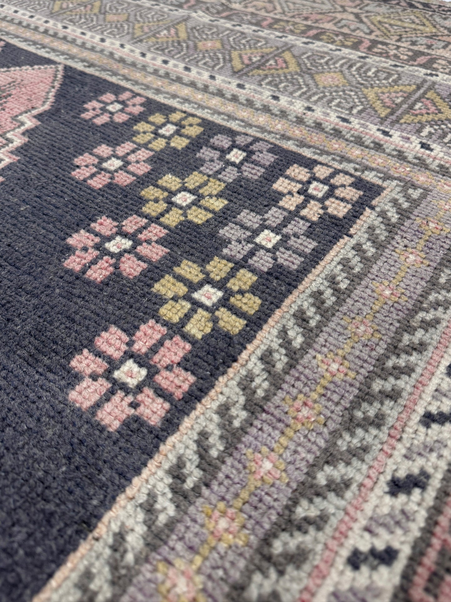 pastel vintage turkish obruk rug 4x7 handwoven anatolian wool rug dusty rose field charcoal navy medallion floral border low pile vintage rug indigo rugs san francisco bay area