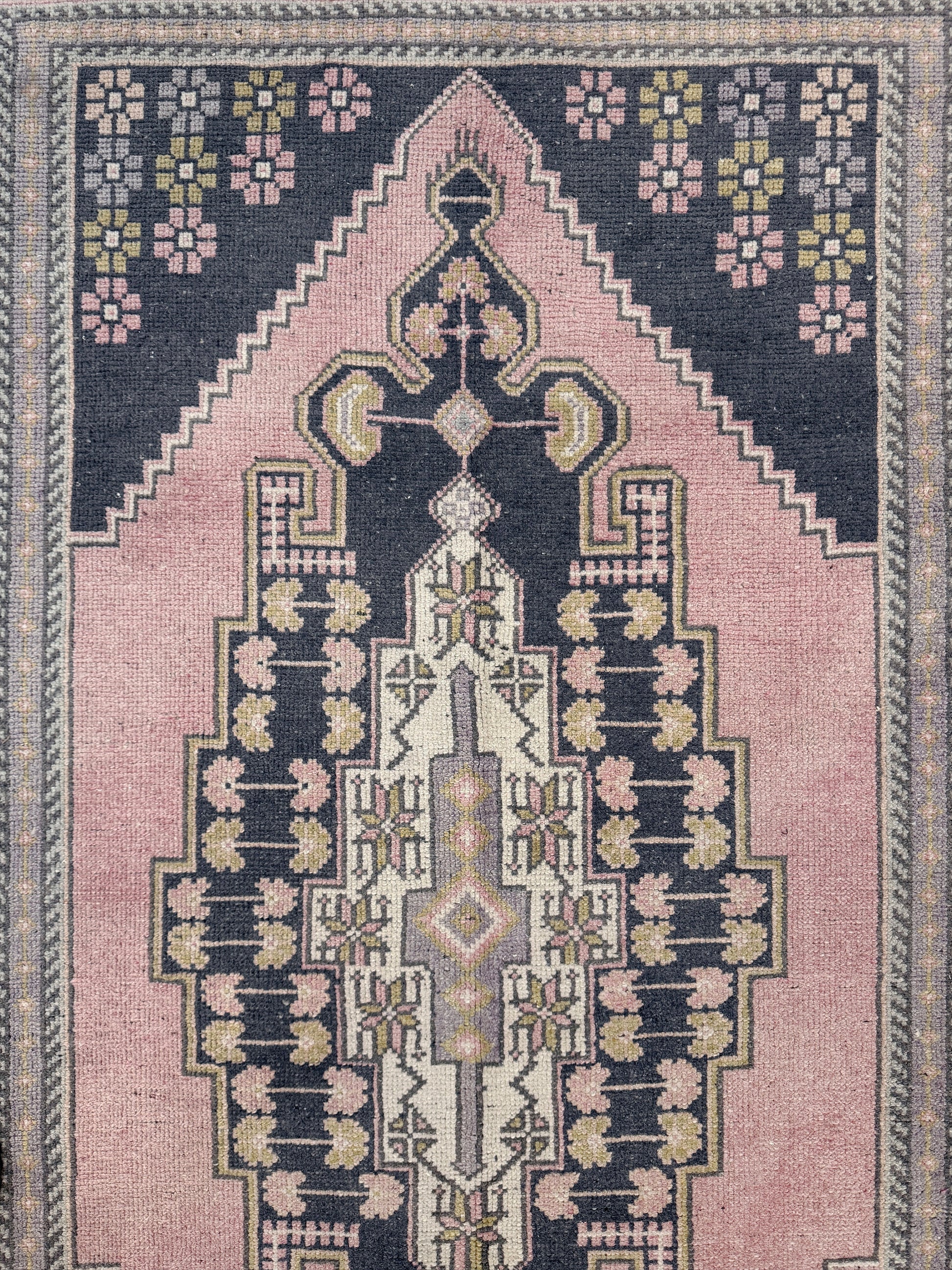 pastel vintage turkish obruk rug 4x7 handwoven anatolian wool rug dusty rose field charcoal navy medallion floral border low pile vintage rug indigo rugs san francisco bay area