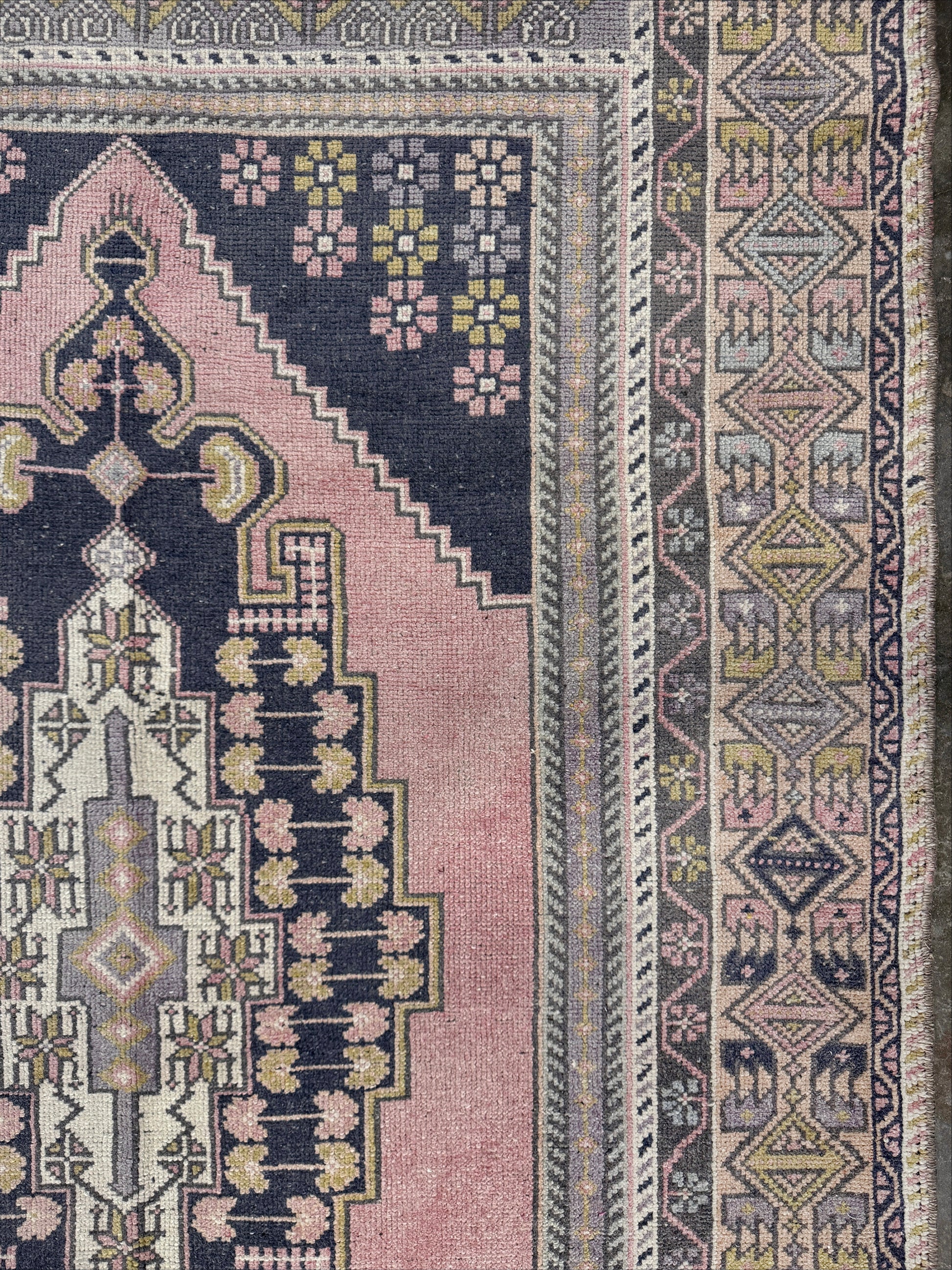 pastel vintage turkish obruk rug 4x7 handwoven anatolian wool rug dusty rose field charcoal navy medallion floral border low pile vintage rug indigo rugs san francisco bay area