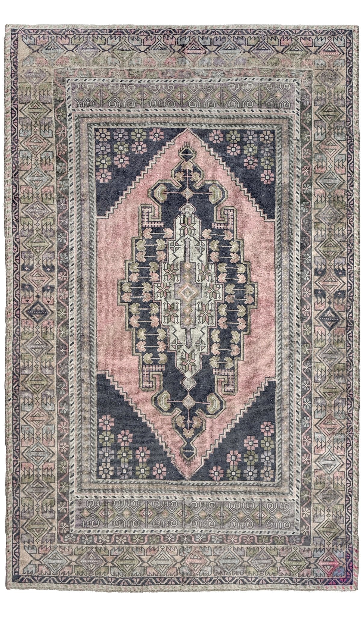 pastel vintage turkish obruk rug 4x7 handwoven anatolian wool rug dusty rose field charcoal navy medallion floral border low pile vintage rug indigo rugs san francisco bay area