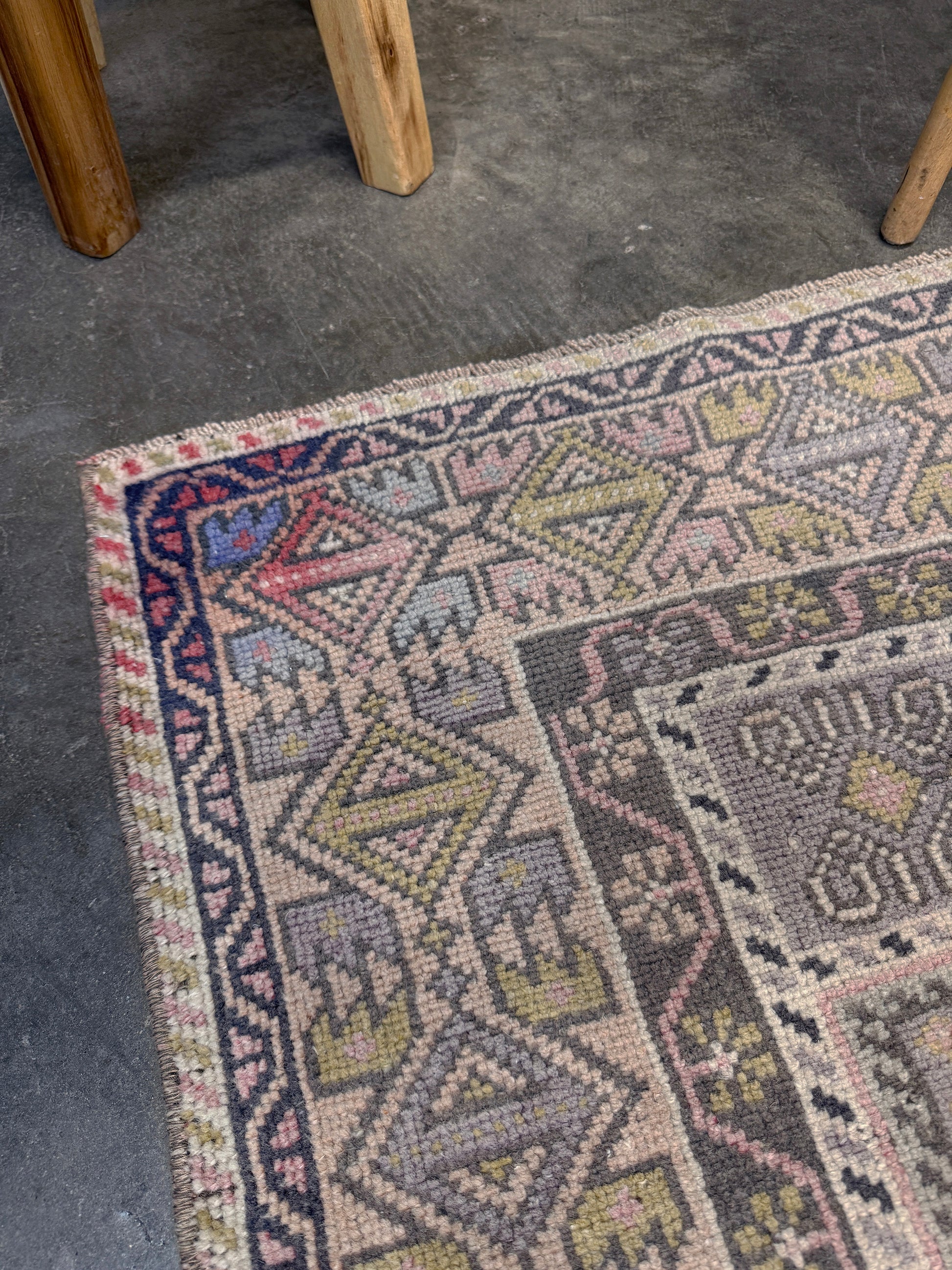 pastel vintage turkish obruk rug 4x7 handwoven anatolian wool rug dusty rose field charcoal navy medallion floral border low pile vintage rug indigo rugs san francisco bay area