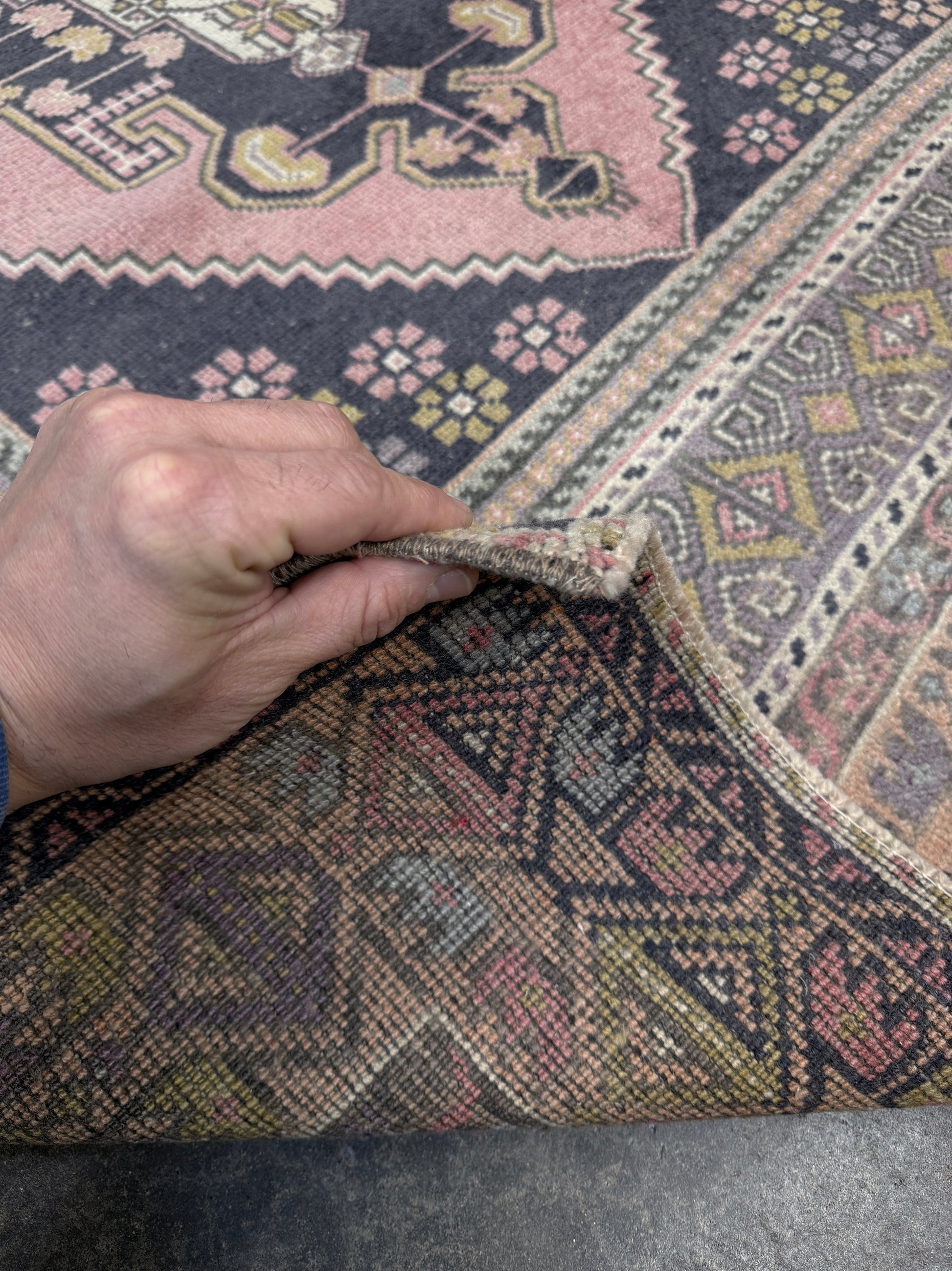 pastel vintage turkish obruk rug 4x7 handwoven anatolian wool rug dusty rose field charcoal navy medallion floral border low pile vintage rug indigo rugs san francisco bay area