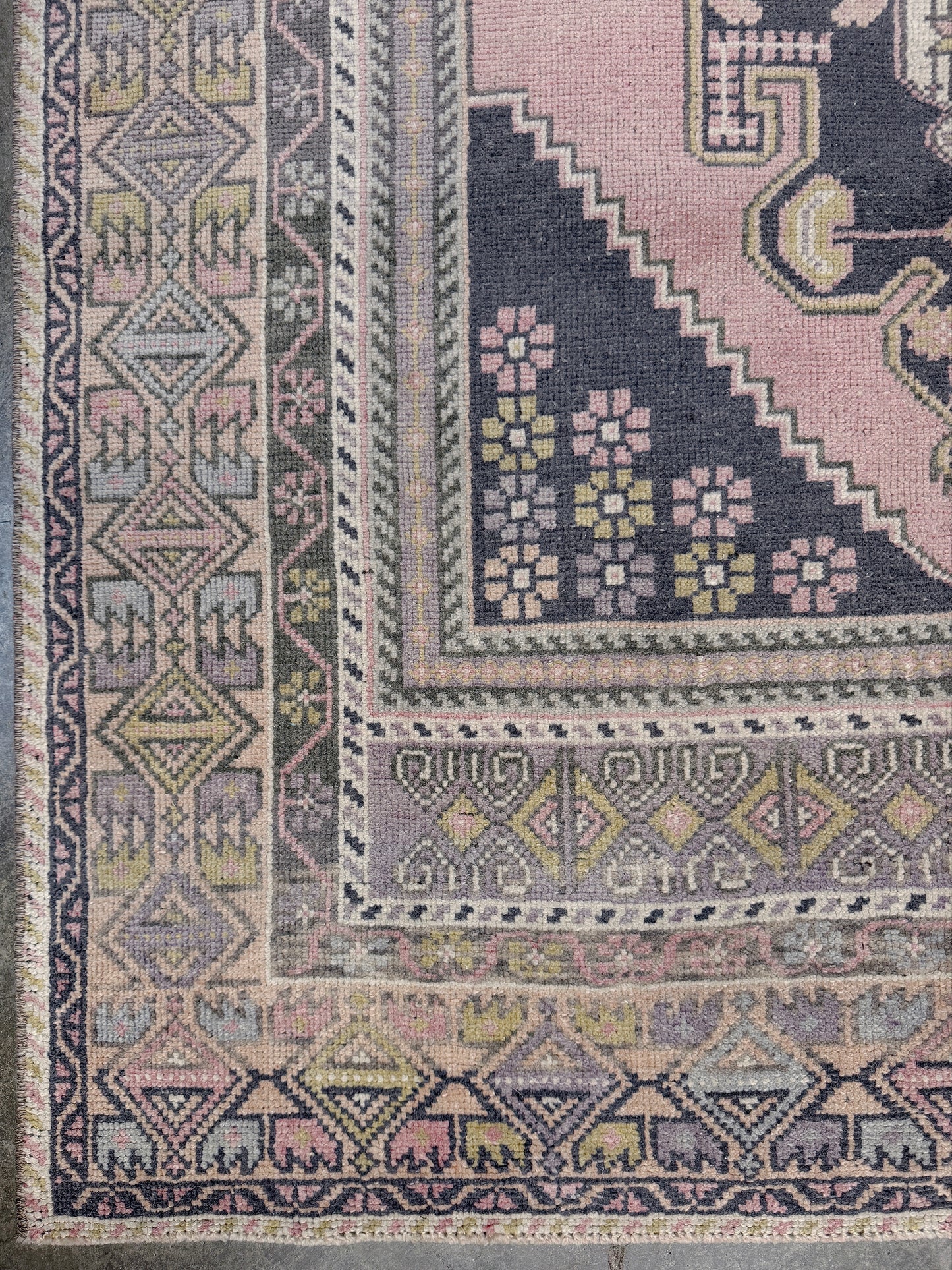 pastel vintage turkish obruk rug 4x7 handwoven anatolian wool rug dusty rose field charcoal navy medallion floral border low pile vintage rug indigo rugs san francisco bay area