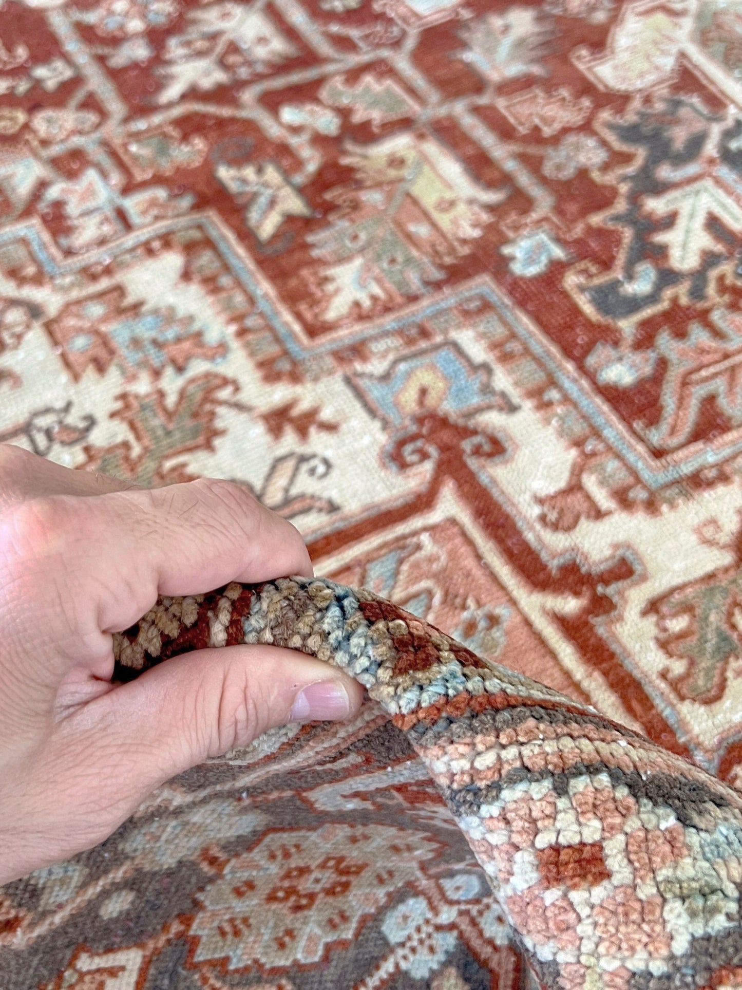 Rust Red Vintage Persian Serapi Heriz area rug. 8x11 Geometric medallion, low pile wool handmade rug ideal for living rooms, bedrooms, dining rooms. from Indigo Rugs, Burlingame — the best rug shop in the San Francisco Bay Area. Free shipping.