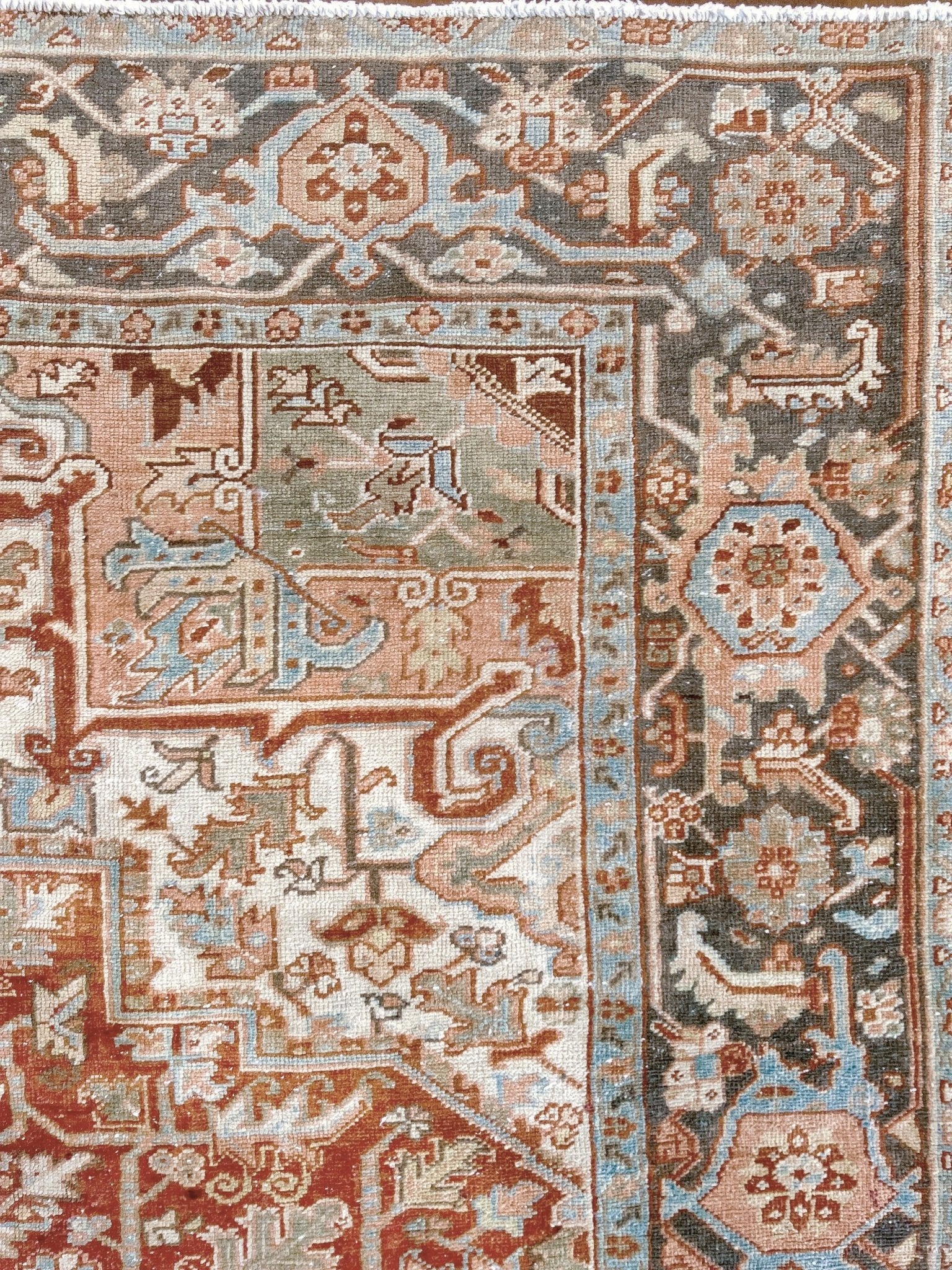Rust Red Vintage Persian Serapi Heriz area rug. 8x11 Geometric medallion, low pile wool handmade rug ideal for living rooms, bedrooms, dining rooms. from Indigo Rugs, Burlingame — the best rug shop in the San Francisco Bay Area. Free shipping.