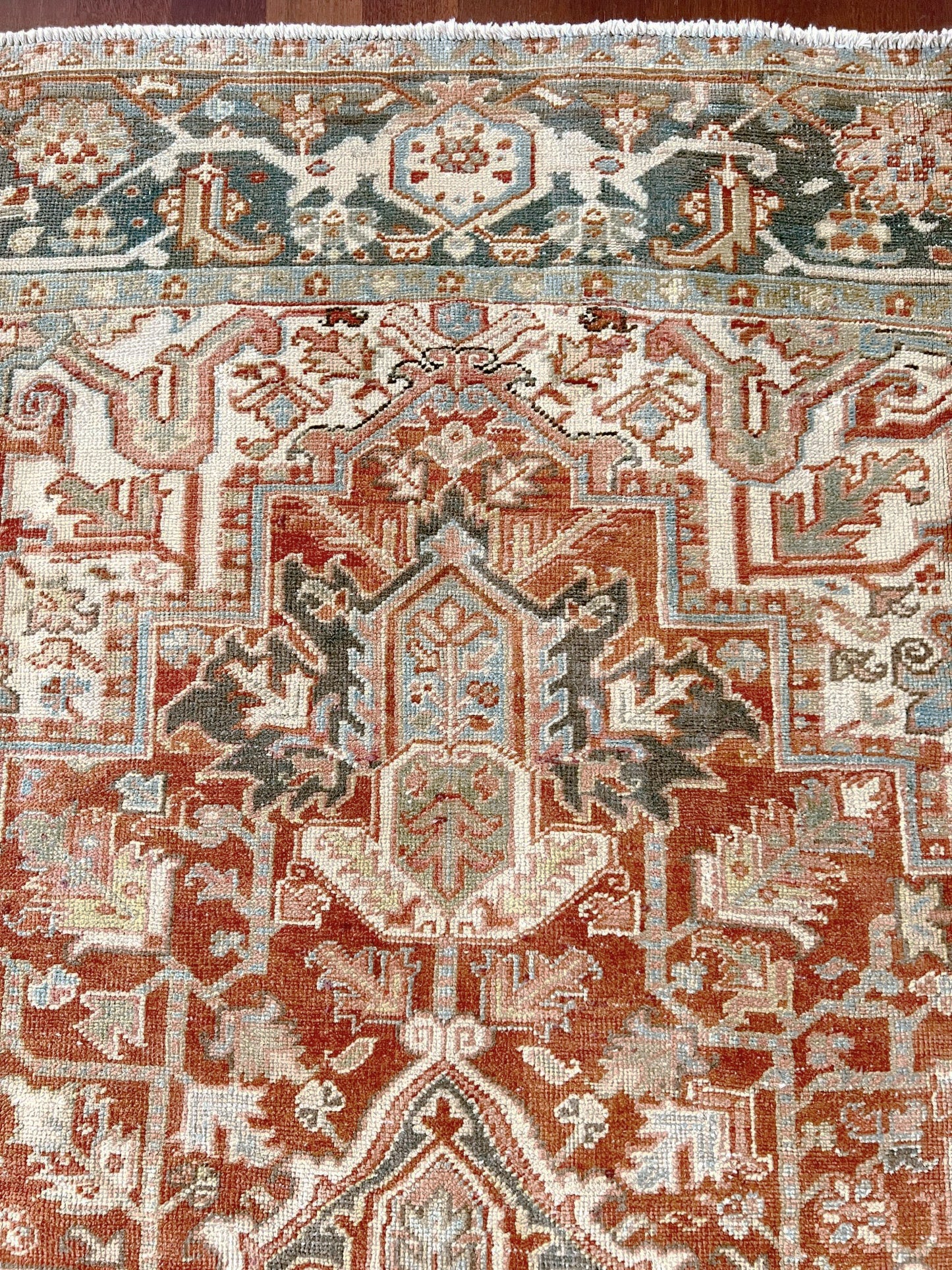 Rust Red Vintage Persian Serapi Heriz area rug. 8x11 Geometric medallion, low pile wool handmade rug ideal for living rooms, bedrooms, dining rooms. from Indigo Rugs, Burlingame — the best rug shop in the San Francisco Bay Area. Free shipping.