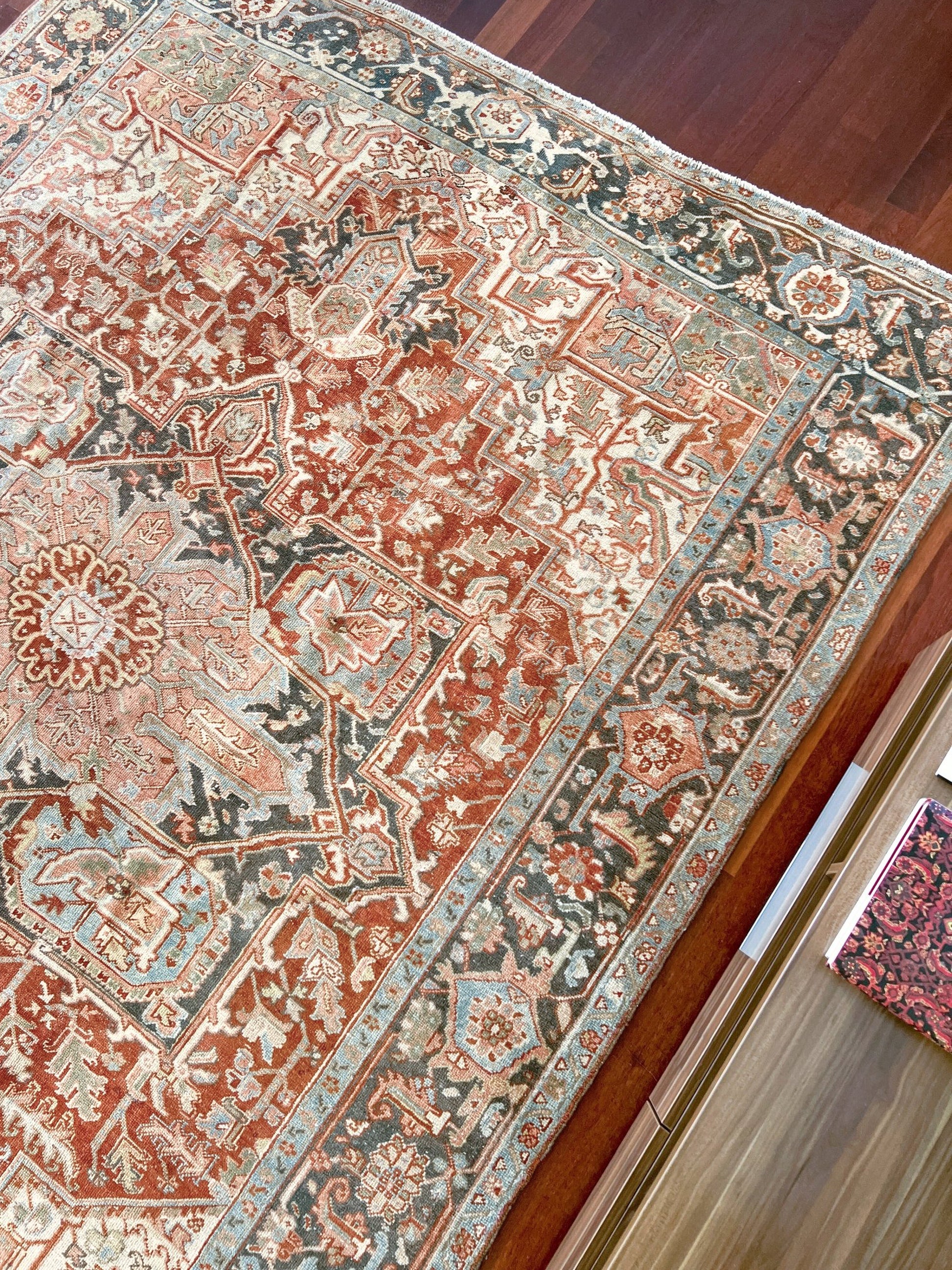 Rust Red Vintage Persian Serapi Heriz area rug. 8x11 Geometric medallion, low pile wool handmade rug ideal for living rooms, bedrooms, dining rooms. from Indigo Rugs, Burlingame — the best rug shop in the San Francisco Bay Area. Free shipping.