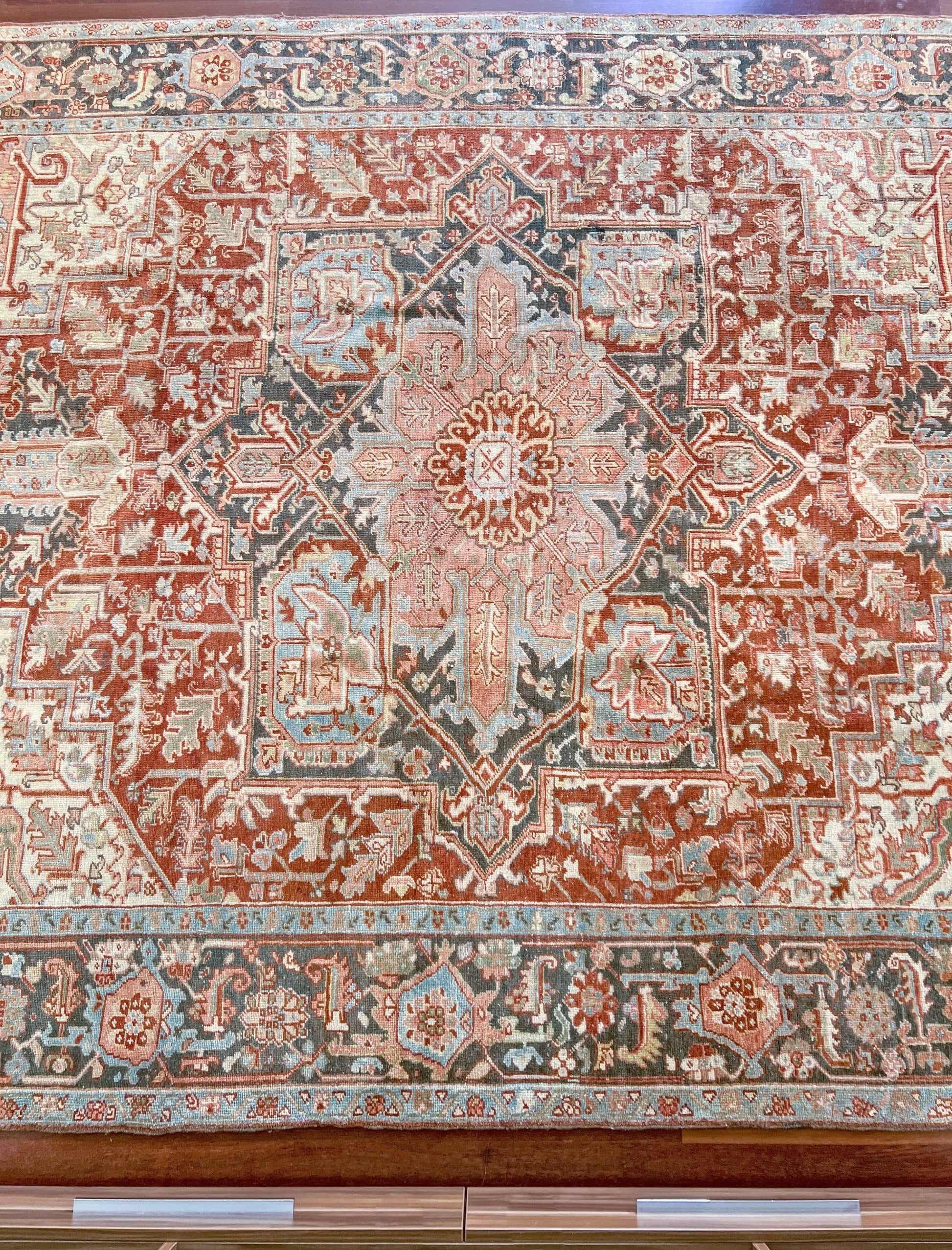 Rust Red Vintage Persian Serapi Heriz area rug. 8x11 Geometric medallion, low pile wool handmade rug ideal for living rooms, bedrooms, dining rooms. from Indigo Rugs, Burlingame — the best rug shop in the San Francisco Bay Area. Free shipping.