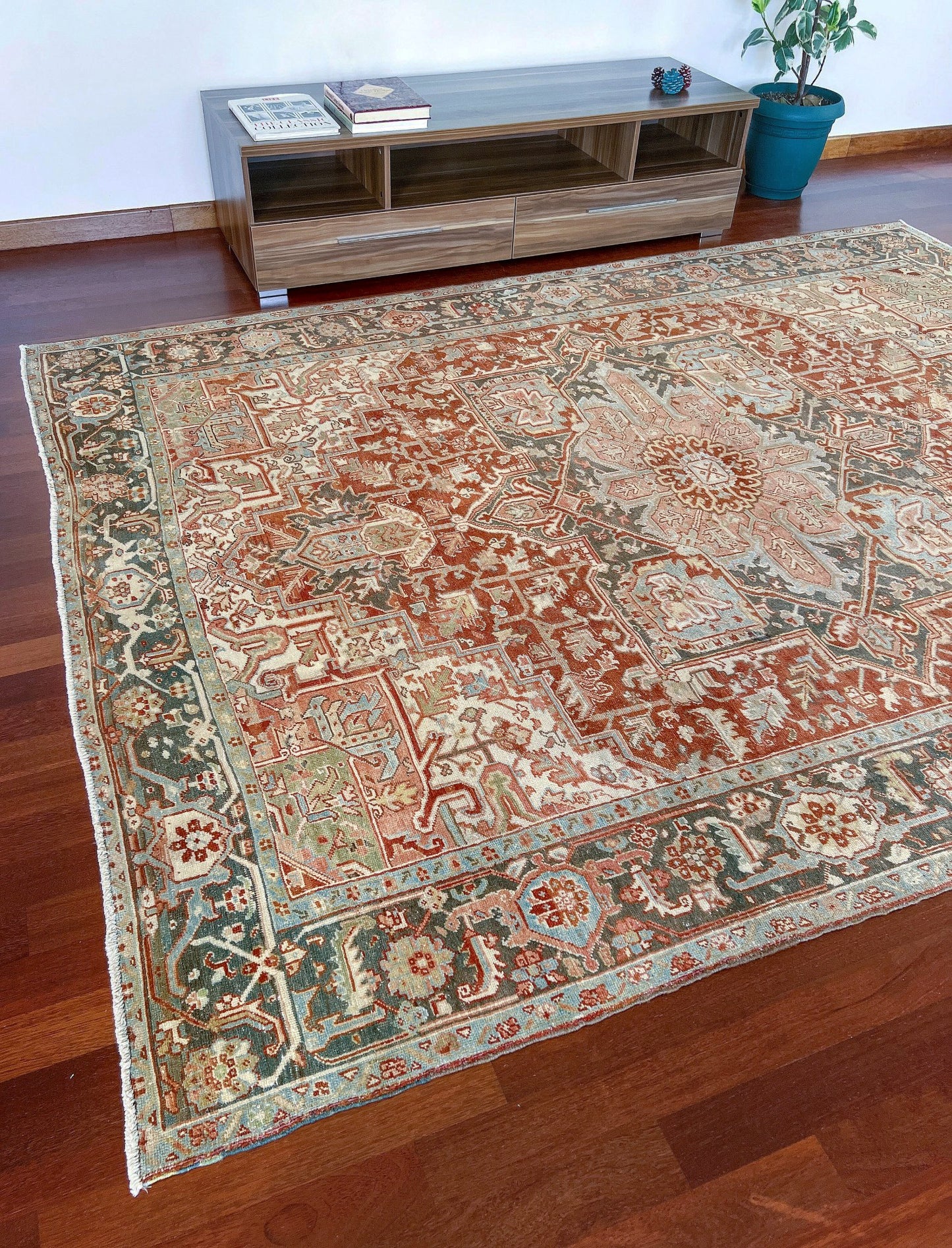 Rust Red Vintage Persian Serapi Heriz area rug. 8x11 Geometric medallion, low pile wool handmade rug ideal for living rooms, bedrooms, dining rooms. from Indigo Rugs, Burlingame — the best rug shop in the San Francisco Bay Area. Free shipping.