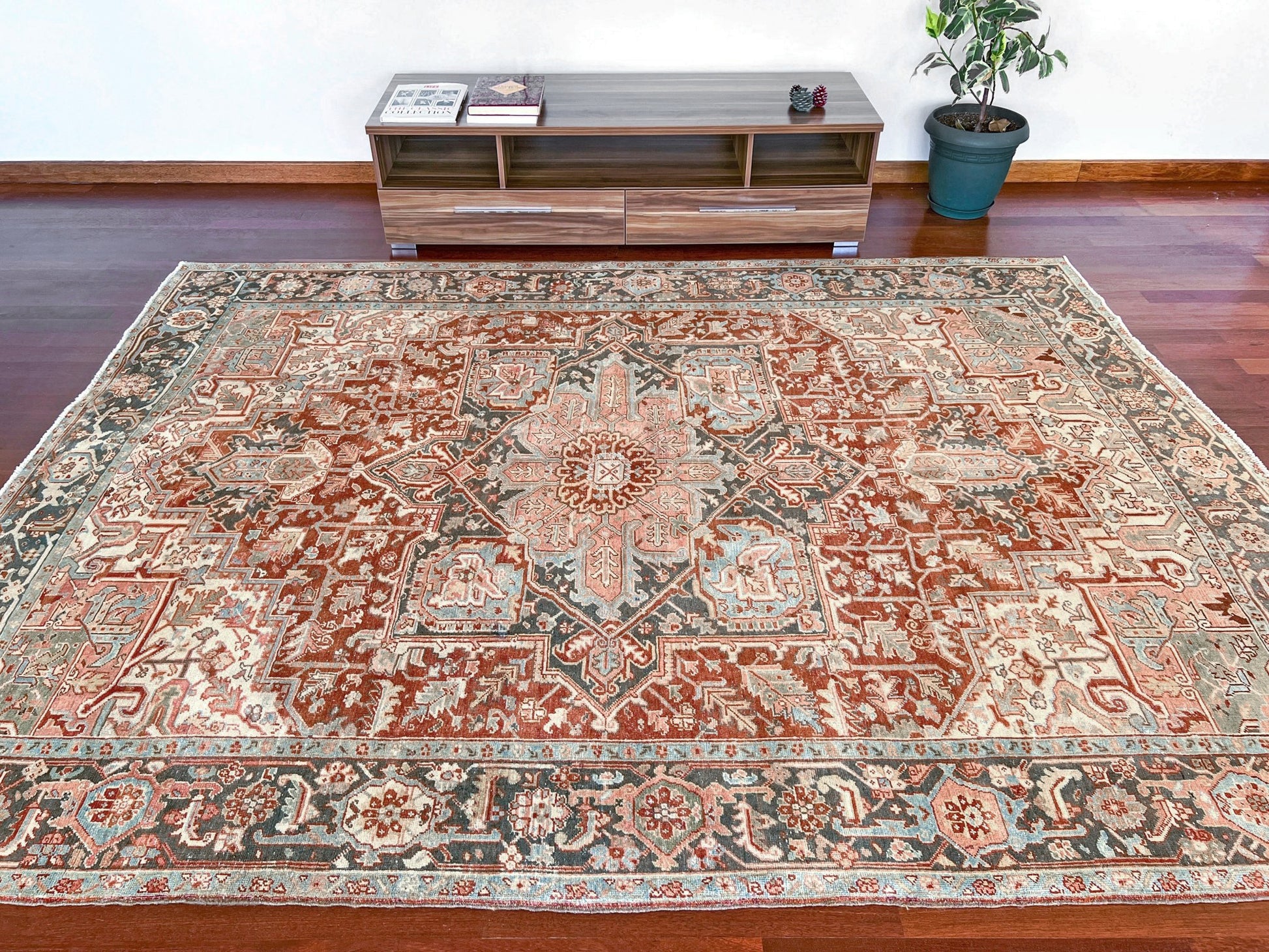 Rust Red Vintage Persian Serapi Heriz area rug. 8x11 Geometric medallion, low pile wool handmade rug ideal for living rooms, bedrooms, dining rooms. from Indigo Rugs, Burlingame — the best rug shop in the San Francisco Bay Area. Free shipping.