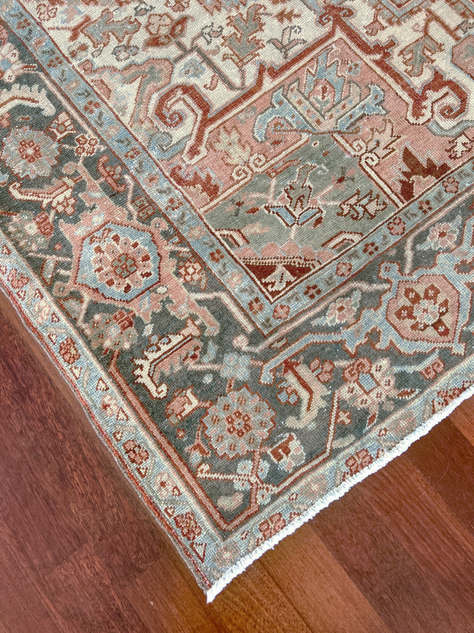 Rust Red Vintage Persian Serapi Heriz area rug. 8x11 Geometric medallion, low pile wool handmade rug ideal for living rooms, bedrooms, dining rooms. from Indigo Rugs, Burlingame — the best rug shop in the San Francisco Bay Area. Free shipping.