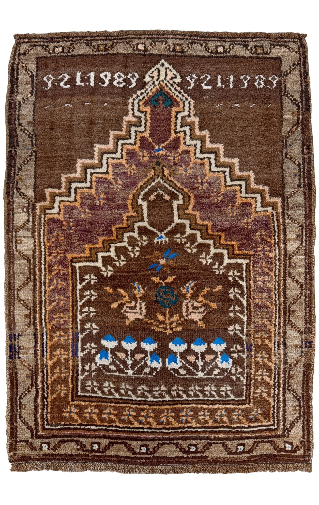 Decorative rug with intricate patterns and numbers on a brown background. 3x4 Kars Wool vintage turkish mini rug. Handmade turkish rug shop san francisco bay area. Buy handmade wool rug online