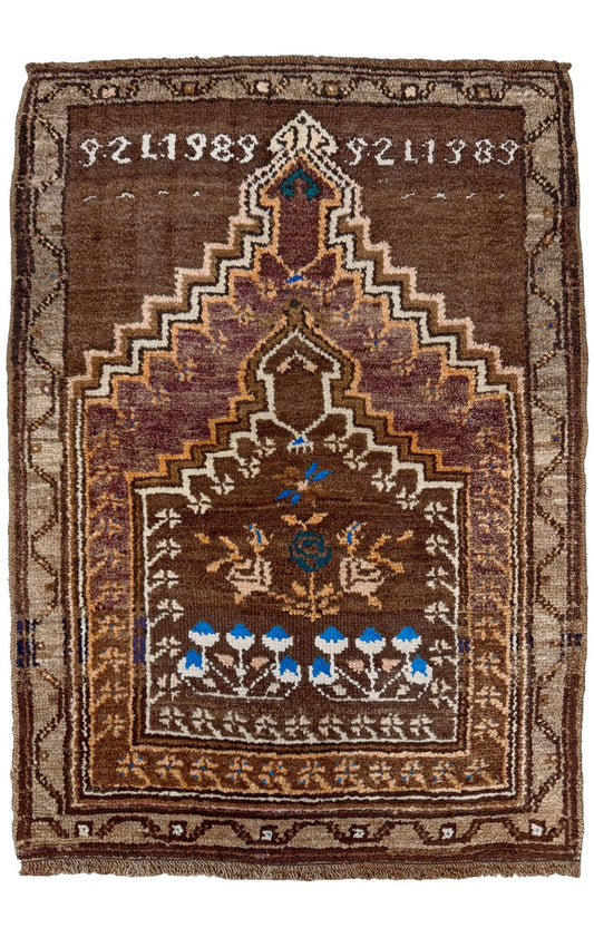 Decorative rug with intricate patterns and numbers on a brown background. 3x4 Kars Wool vintage turkish mini rug. Handmade turkish rug shop san francisco bay area. Buy handmade wool rug online