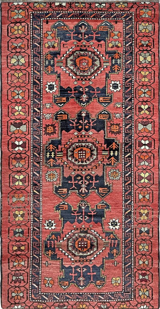 Vintage Derbend Caucasian runner rug 3x7 with terracotta field, navy medallions, camel and ivory accents, and tribal village motifs — free shipping from the best rug shop in the San Francisco Bay Area, Burlingame CA.