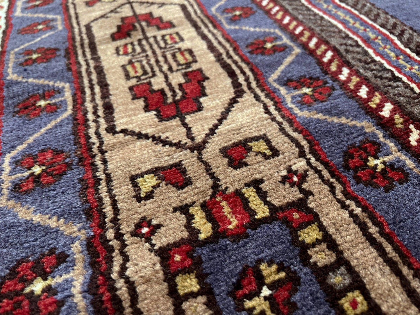 Vintage Taspinar Turkish rug (6x9) with ivory, brick red, and indigo medallion design—handmade wool, strong pile, excellent condition. Perfect for living rooms, bedrooms, or kitchens. Durable, tribal geometric style. Free shipping from Indigo Rugs, the best rug shop in Burlingame, Bay Area.