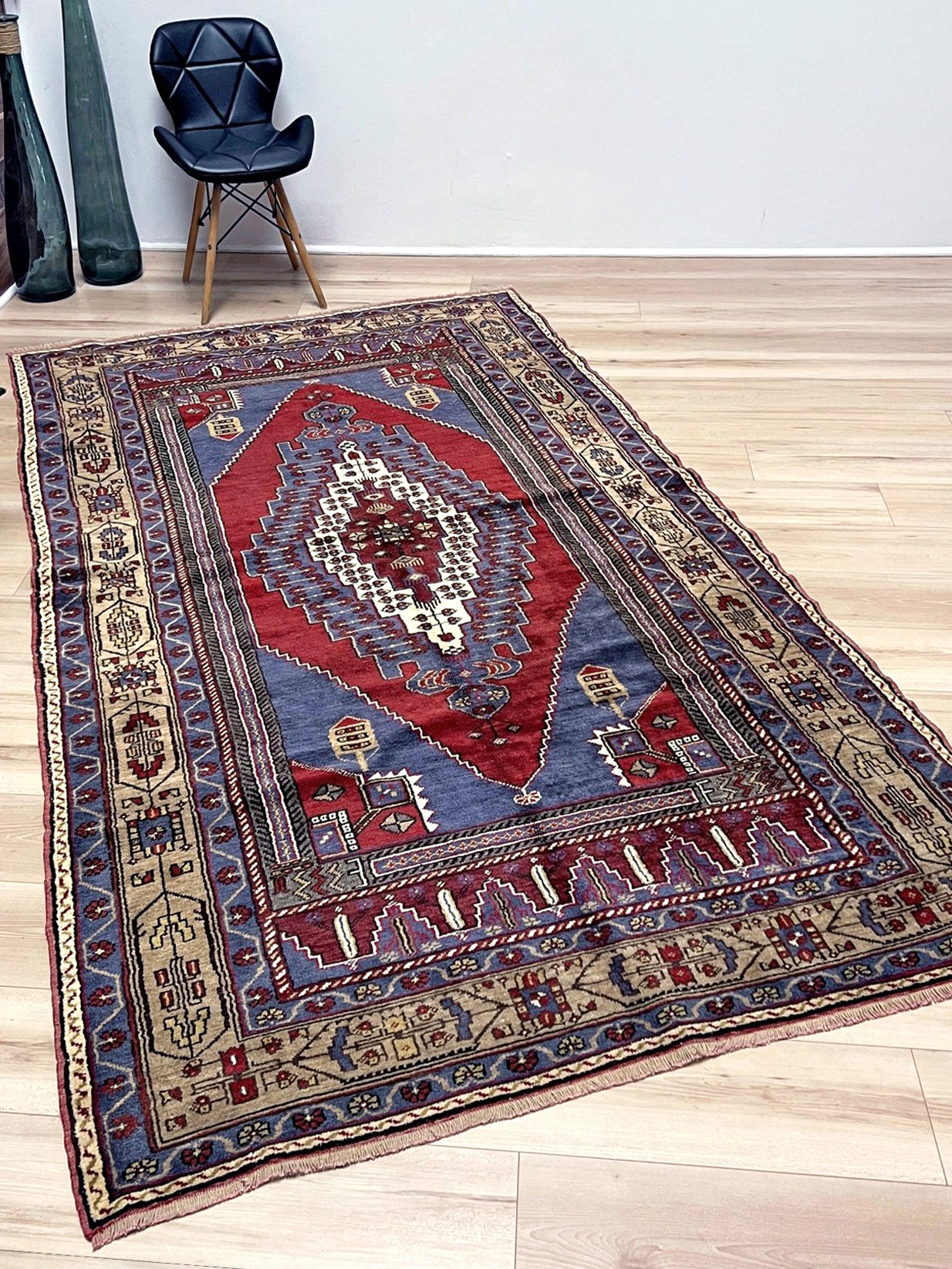 Vintage Taspinar Turkish rug (6x9) with ivory, brick red, and indigo medallion design—handmade wool, strong pile, excellent condition. Perfect for living rooms, bedrooms, or kitchens. Durable, tribal geometric style. Free shipping from Indigo Rugs, the best rug shop in Burlingame, Bay Area.