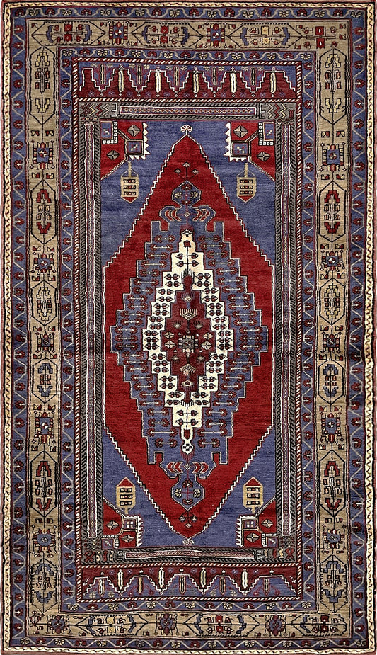 Vintage Taspinar Turkish rug (6x9) with ivory, brick red, and indigo medallion design—handmade wool, strong pile, excellent condition. Perfect for living rooms, bedrooms, or kitchens. Durable, tribal geometric style. Free shipping from Indigo Rugs, the best rug shop in Burlingame, Bay Area.