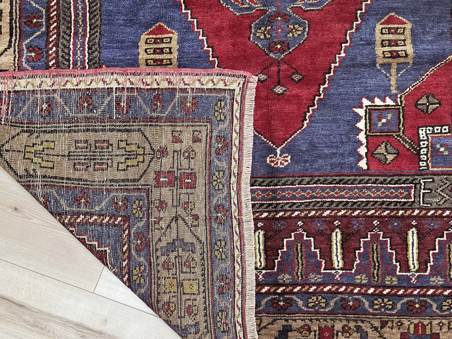 Vintage Taspinar Turkish rug (6x9) with ivory, brick red, and indigo medallion design—handmade wool, strong pile, excellent condition. Perfect for living rooms, bedrooms, or kitchens. Durable, tribal geometric style. Free shipping from Indigo Rugs, the best rug shop in Burlingame, Bay Area.