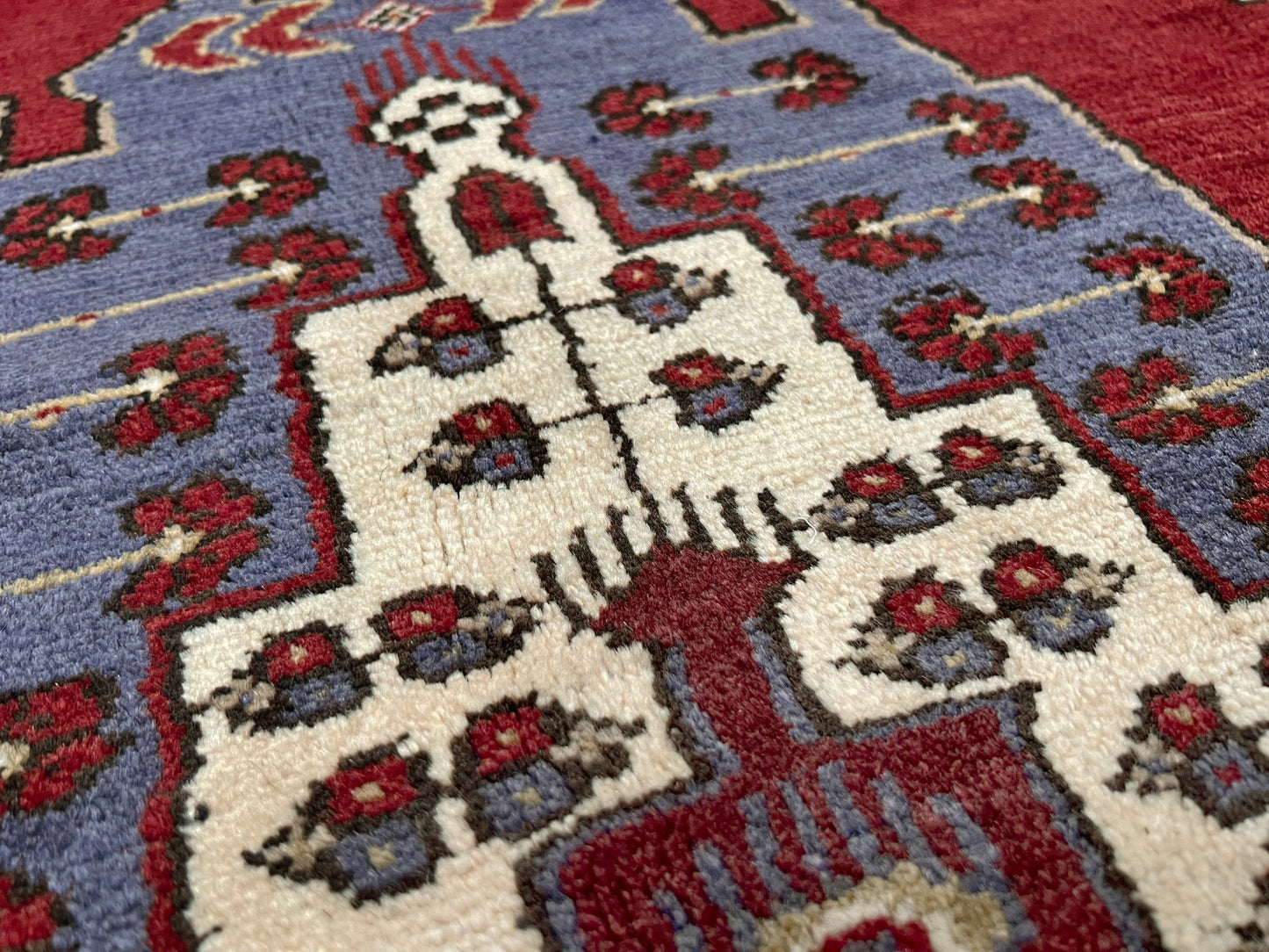 Vintage Taspinar Turkish rug (6x9) with ivory, brick red, and indigo medallion design—handmade wool, strong pile, excellent condition. Perfect for living rooms, bedrooms, or kitchens. Durable, tribal geometric style. Free shipping from Indigo Rugs, the best rug shop in Burlingame, Bay Area.