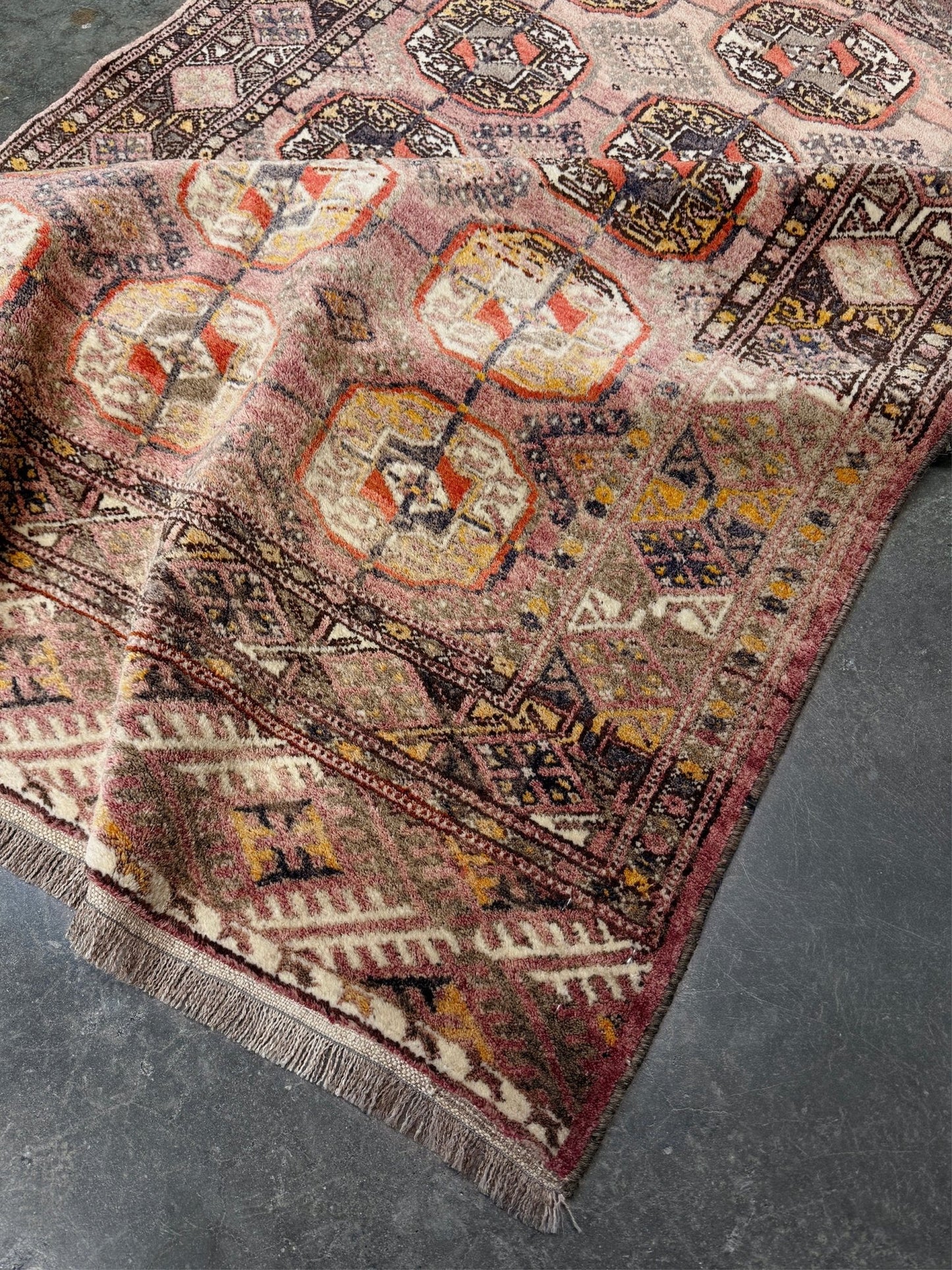 Earthy Muted Bukhara Turkmen rug  vintage handwoven wool carpet with tribal gul motifs and aged patina, 4x5 neutral area rug for entry under desk nursery, living room, bedroom, study, office.