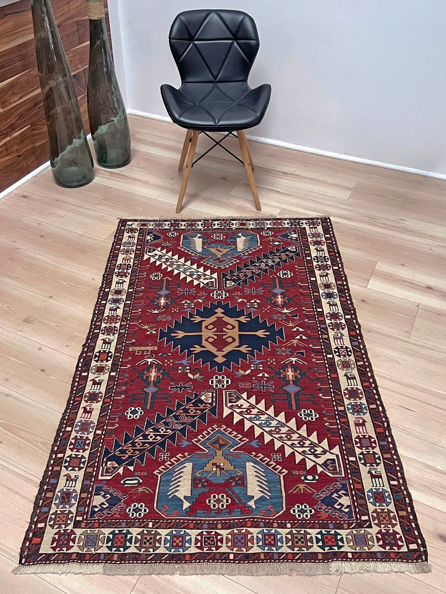 Vintage Shahsavan Soumak flatweave rug from Northwest Iran featuring red, ivory, and blue tribal medallions — handmade Persian wool 3x5 wall hanging, available at Indigo Rugs, the best rug shop in San Francisco Bay Area, Burlingame CA.