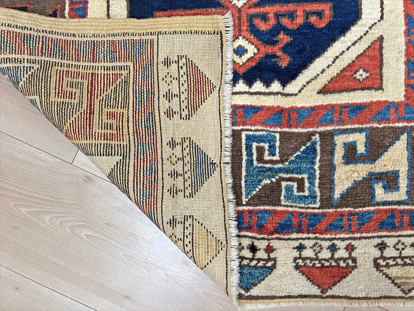 Turkish Konya handmade wool mini rug with geometric tribal medallion, navy field, and rust and ivory accents — 3×3.5 hand-knotted small carpet. square wool handmade Mini Rug rug shop san francisco bay area. Buy rug online free shipping USA Canada.