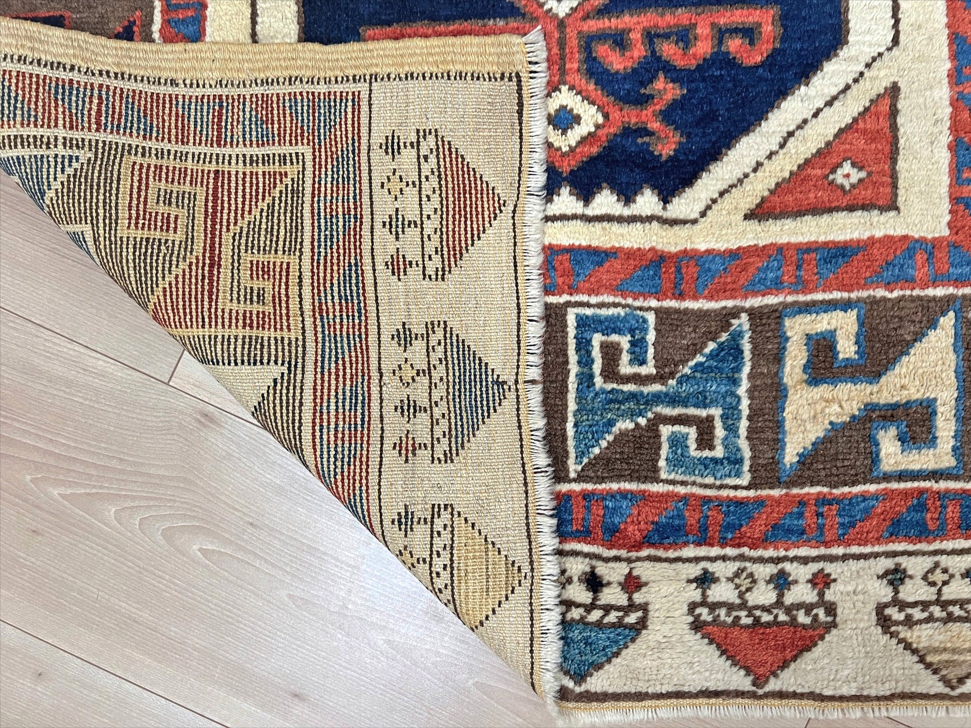 Turkish Konya handmade wool mini rug with geometric tribal medallion, navy field, and rust and ivory accents — 3×3.5 hand-knotted small carpet. square wool handmade Mini Rug rug shop san francisco bay area. Buy rug online free shipping USA Canada.