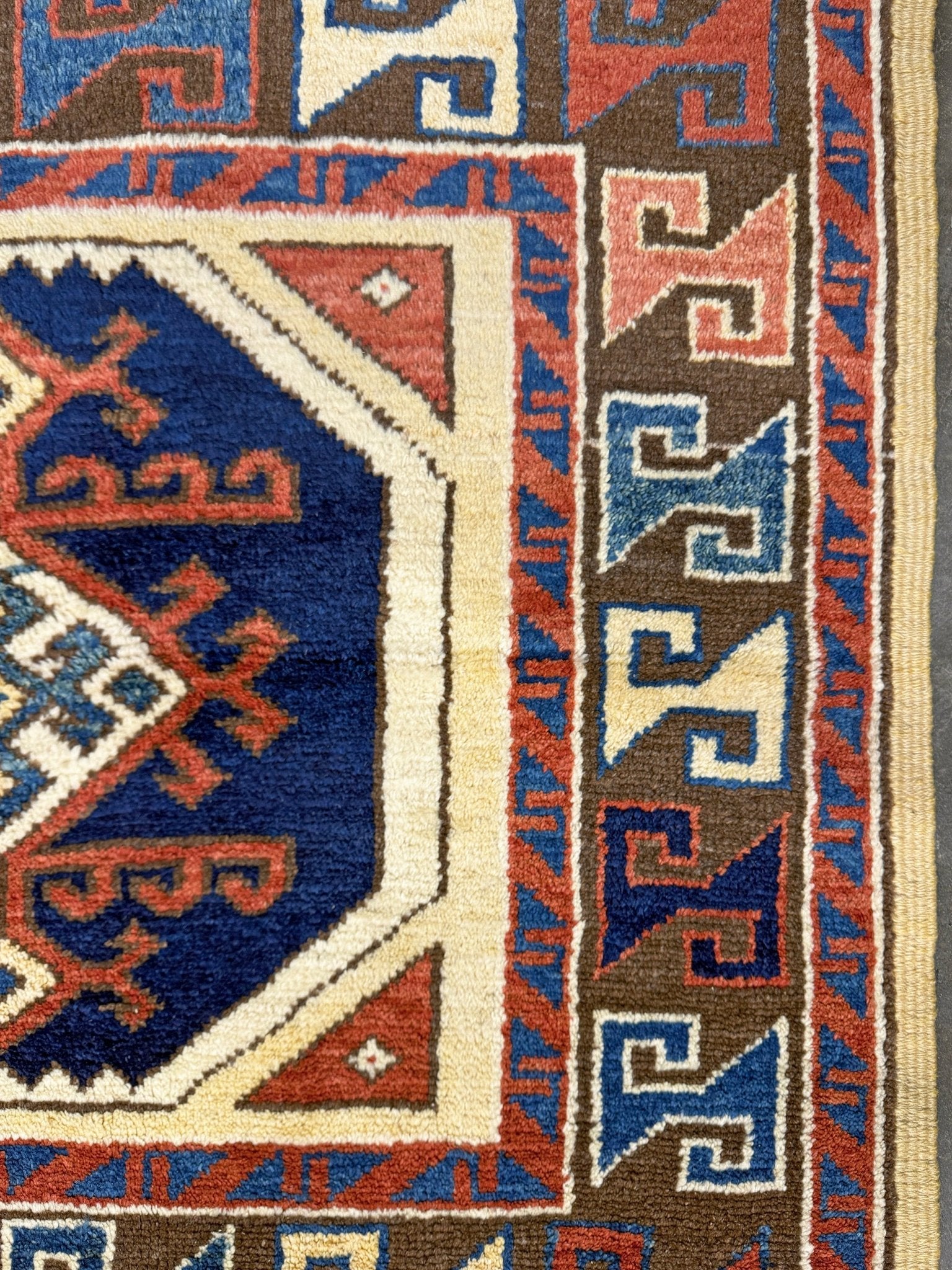 3x3 Square Turkish handmade wool mini geometric rug with beige, navy colors. Wool hand knotted scatter rug shop san francisco bay area.