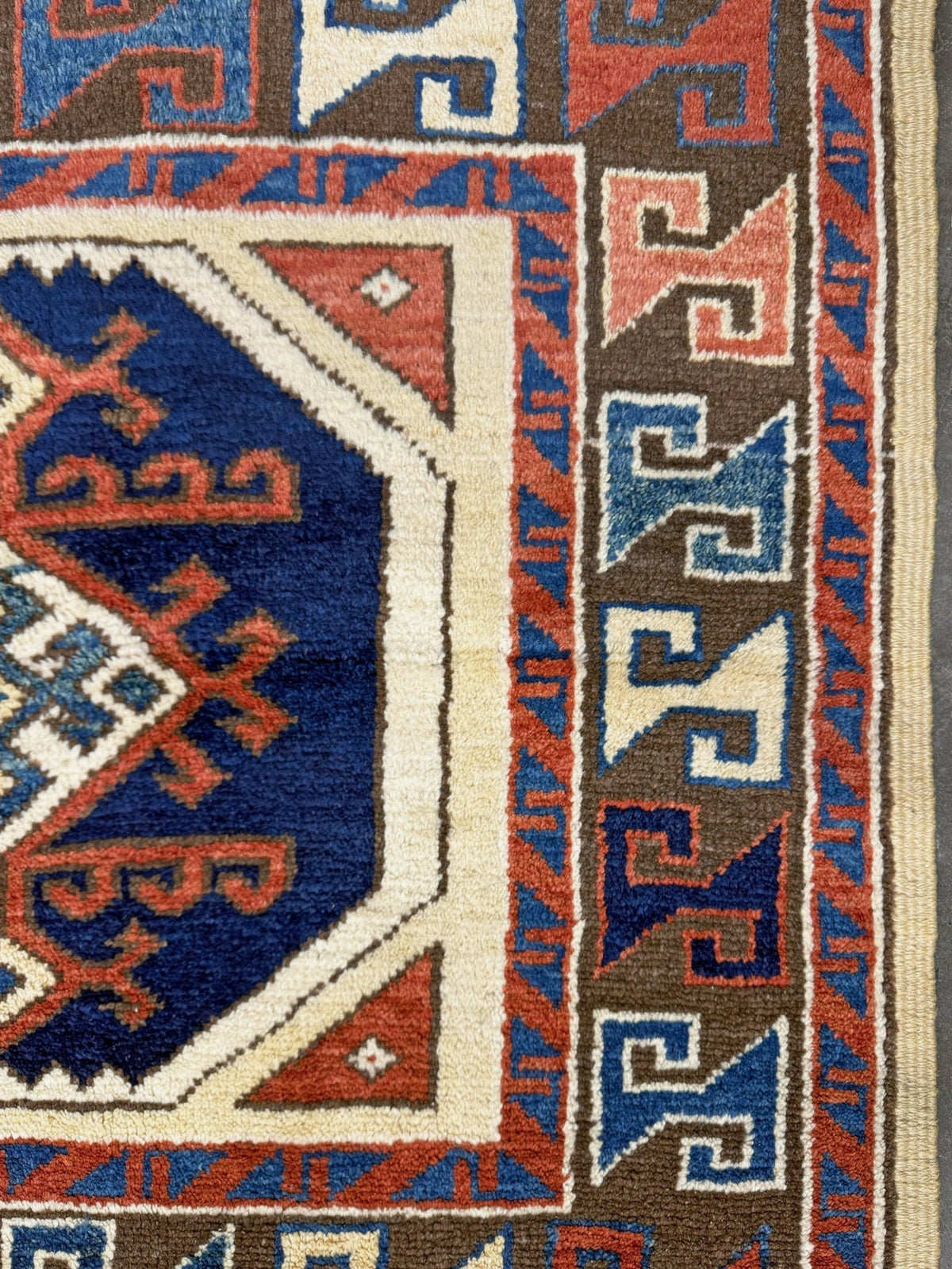 3x3 Square Turkish handmade wool mini geometric rug with beige, navy colors. Wool hand knotted scatter rug shop san francisco bay area.