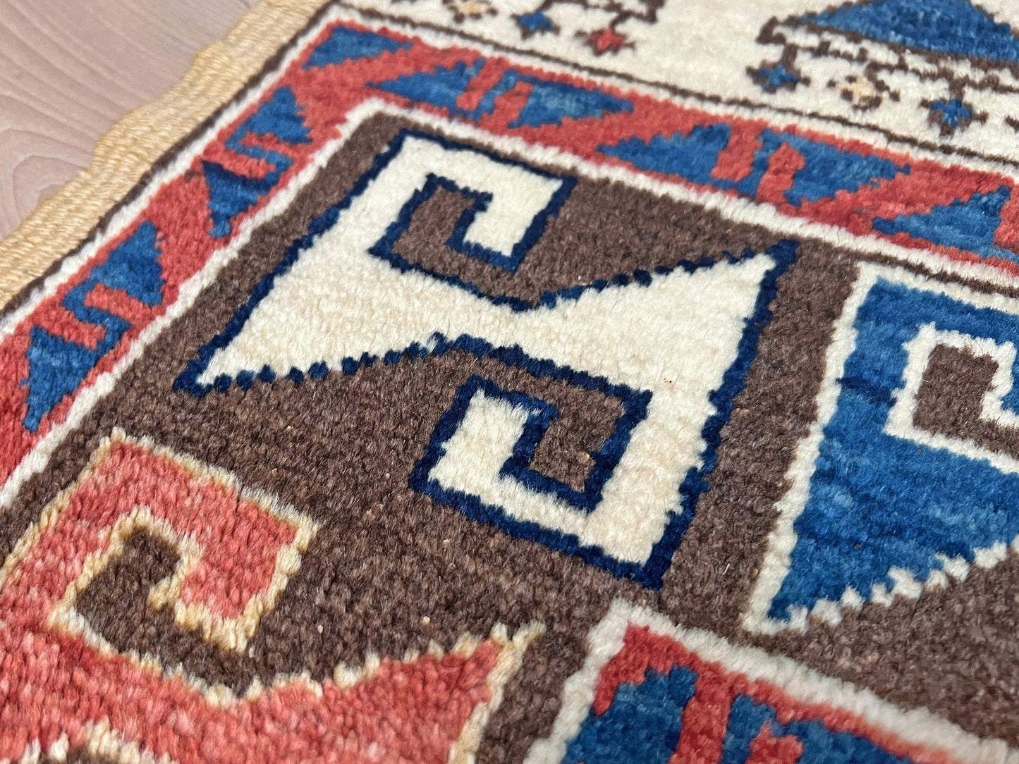 Turkish Konya handmade wool mini rug with geometric tribal medallion, navy field, and rust and ivory accents — 3×3.5 hand-knotted small carpet. square wool handmade Mini Rug rug shop san francisco bay area. Buy rug online free shipping USA Canada.