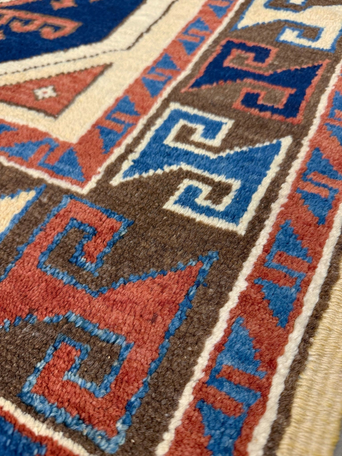 3x3 Square Turkish handmade wool mini geometric rug with beige, navy colors. Wool hand knotted scatter rug shop san francisco bay area.