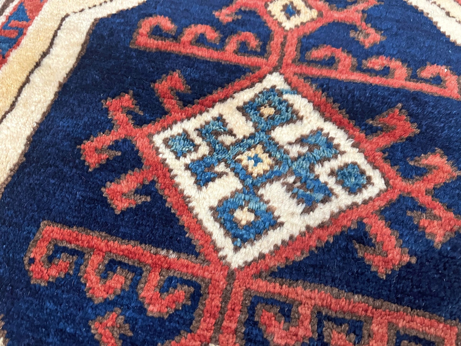 Turkish Konya handmade wool mini rug with geometric tribal medallion, navy field, and rust and ivory accents — 3×3.5 hand-knotted small carpet. square wool handmade Mini Rug rug shop san francisco bay area. Buy rug online free shipping USA Canada.