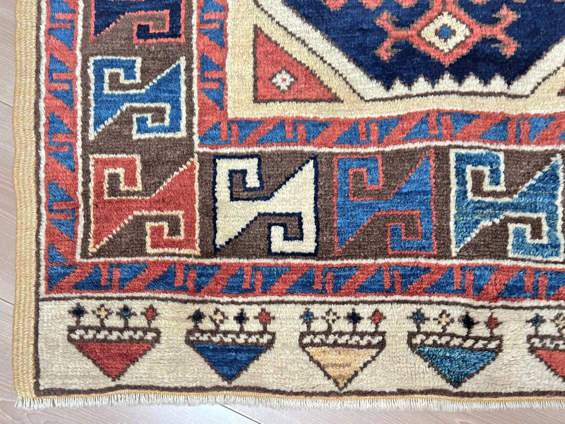 3x3 Square Turkish handmade wool mini geometric rug with beige, navy colors. Wool hand knotted scatter rug shop san francisco bay area.