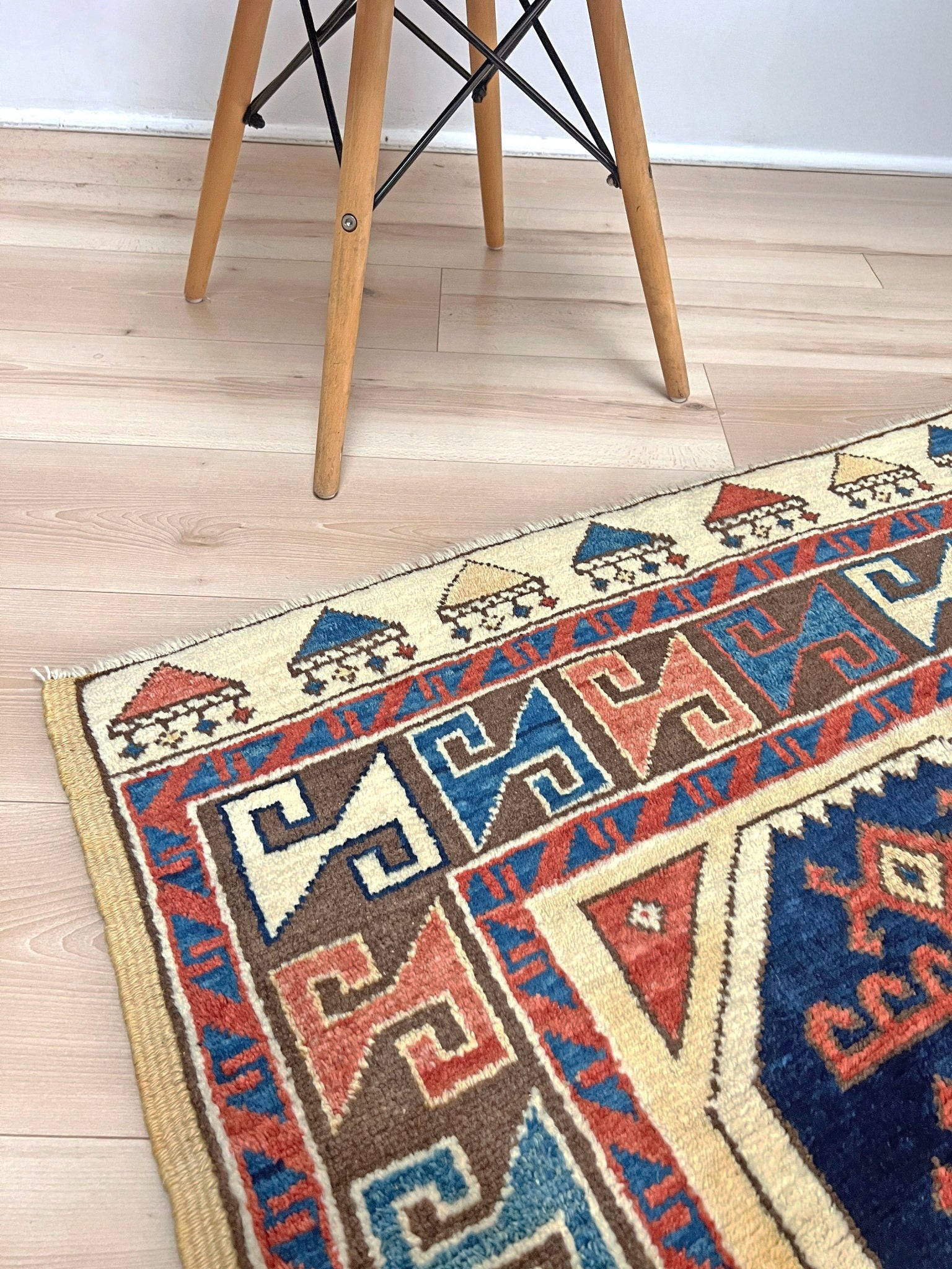 Turkish Konya handmade wool mini rug with geometric tribal medallion, navy field, and rust and ivory accents — 3×3.5 hand-knotted small carpet. square wool handmade Mini Rug rug shop san francisco bay area. Buy rug online free shipping USA Canada.