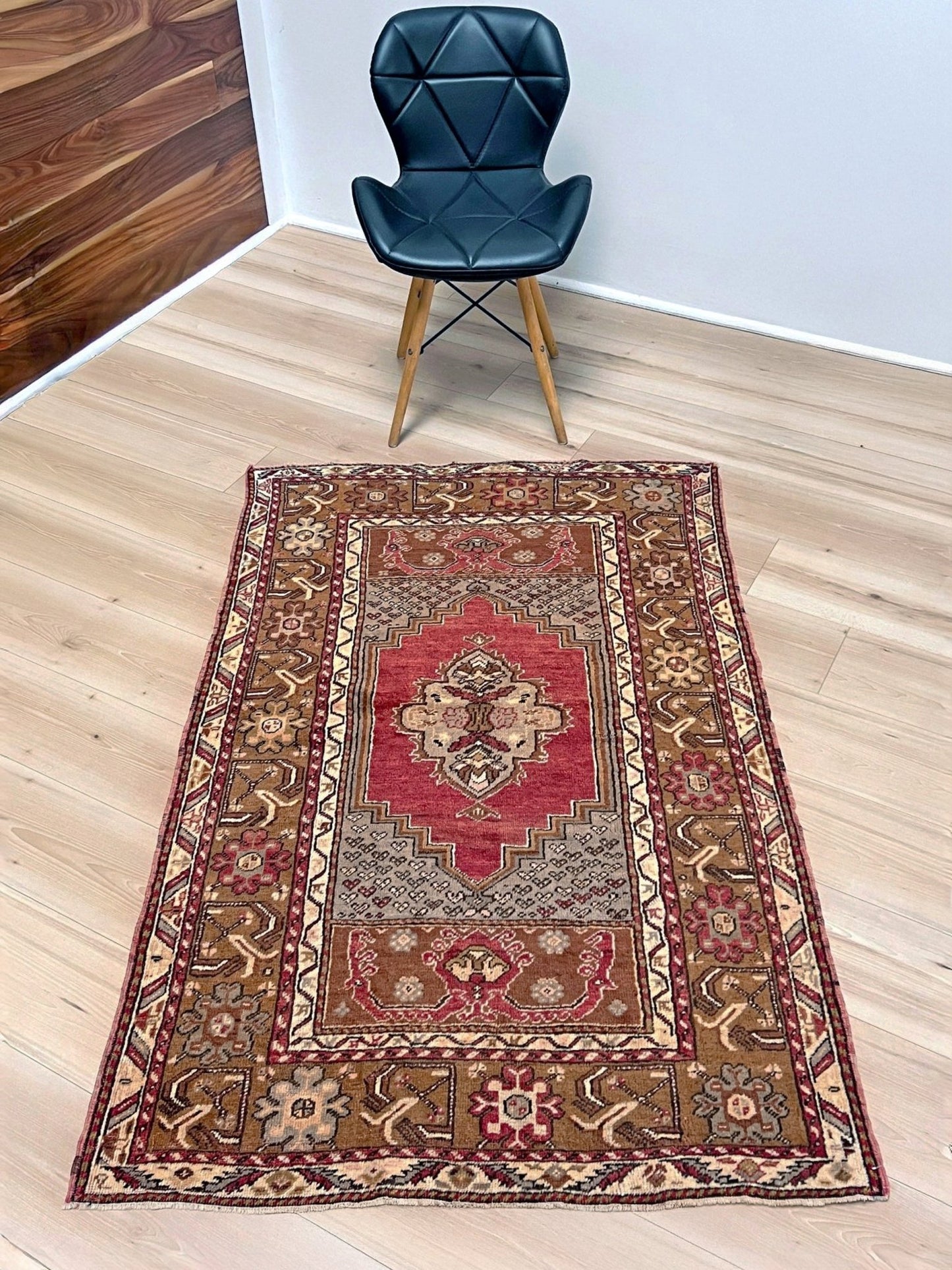 Vintage Turkish Kirsehir rug with russet red field and geometric medallion, hand-knotted wool pile on wool foundation, featuring camel, taupe, and faded gold floral borders — 1950s Anatolian small accent rug 3x5.