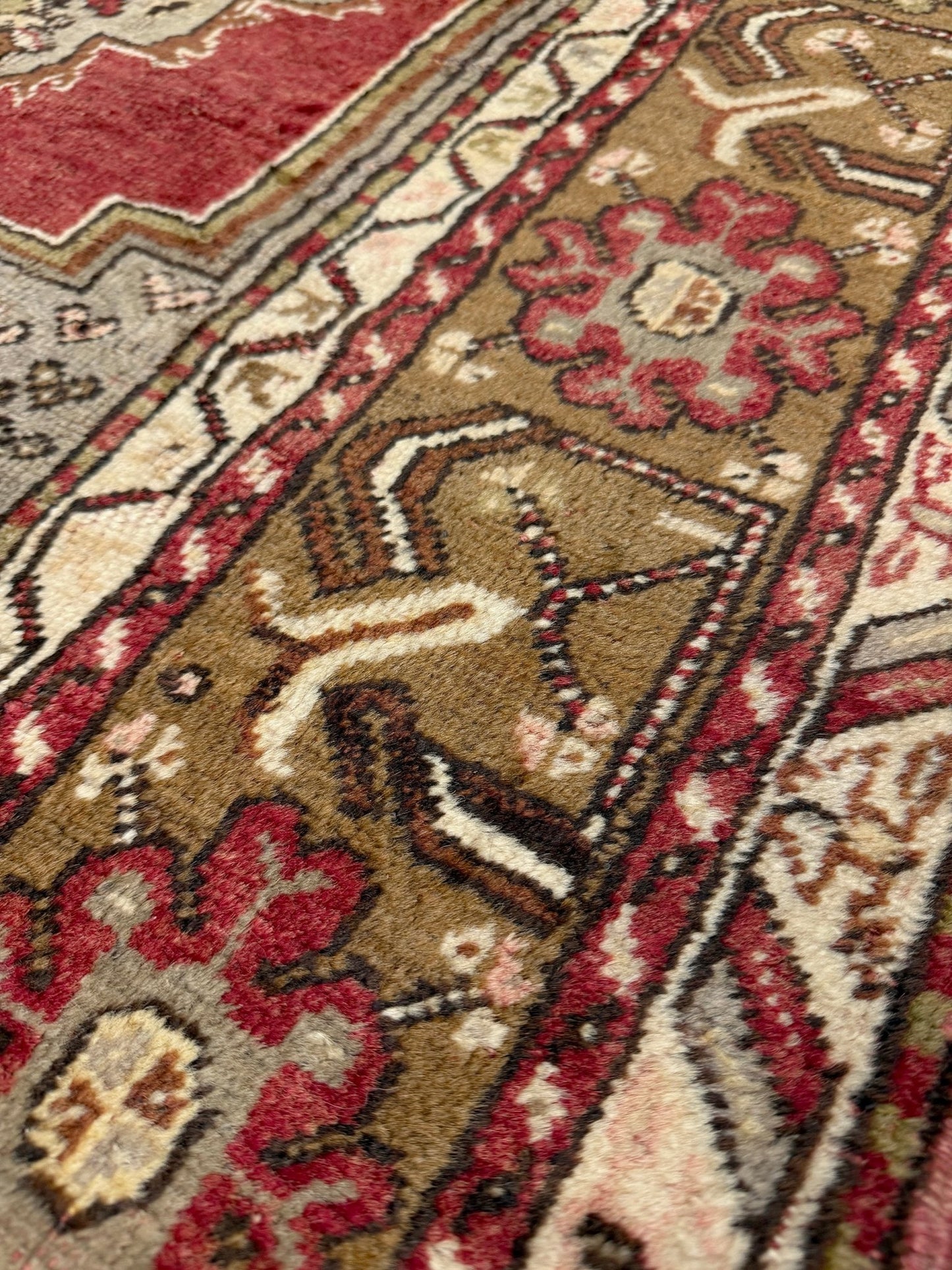 Vintage Turkish Kirsehir rug with russet red field and geometric medallion, hand-knotted wool pile on wool foundation, featuring camel, taupe, and faded gold floral borders — 1950s Anatolian small accent rug 3x5.
