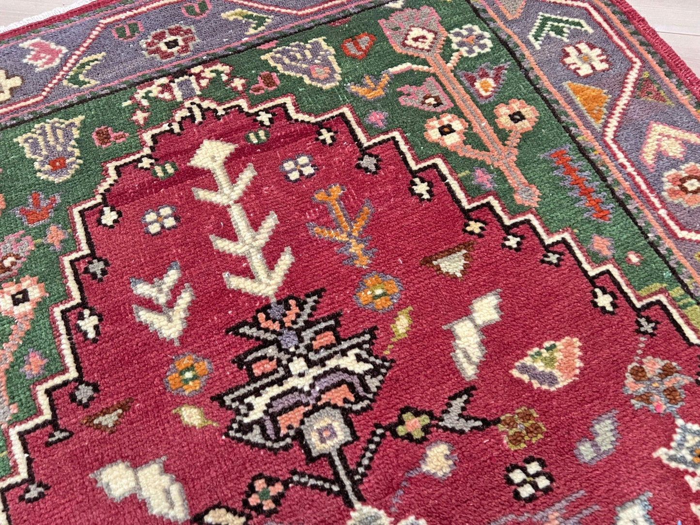 Vintage Turkish Maden prayer rug with russet rose field, emerald green spandrels, and floral motifs — handmade wool 3×4 mini carpet. intage turkish mini rug for entry bedroom bathroom under the desk nursery kitchen. Turkish rug shop san francisco bay area. Handmade wool rug buy online 