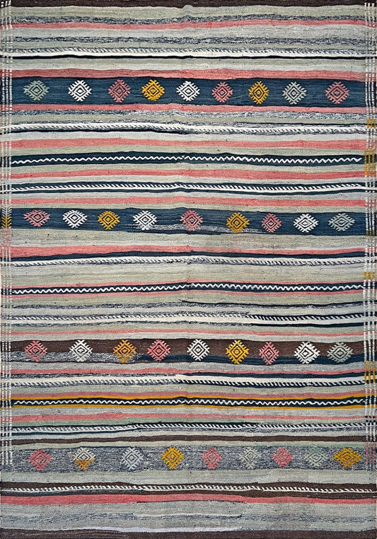 5x7 vintage turkish kilim rug in living room setting, bright colors, indigo rugs, soft rug, bold color, San Francisco Bay Area, California, rug store, rug shop, local shop, vintage rug, modern kilim, warm colors, antique rug, antique kilim.