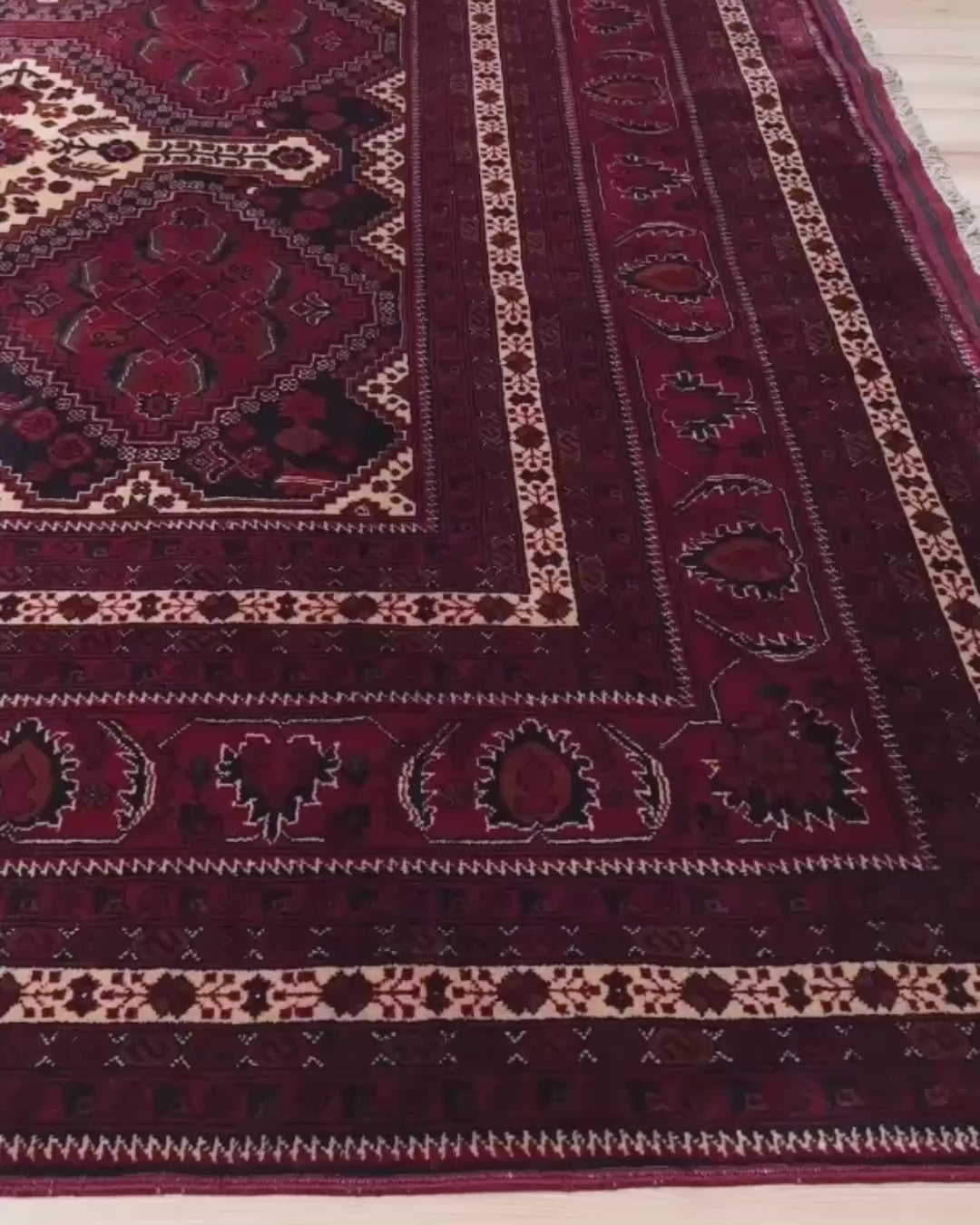Handmade Turkmen rug with peacock design in red, ivory, and indigo tones, made of velvet-soft Merino wool – available at the best rug shop in SF Bay Area with free shipping.