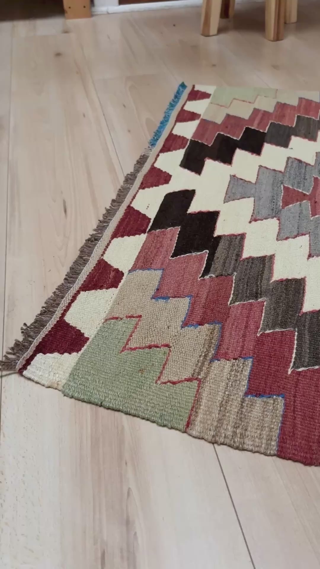 3x5 Vintage Mut kilim rug with Navajo-style stepped medallion design in clay red and charcoal — handwoven wool flatweave from 1970s Turkey, available at Indigo Rugs, Burlingame CA. Handmade rug with earth color for living room, bedroom, kitchen, study.