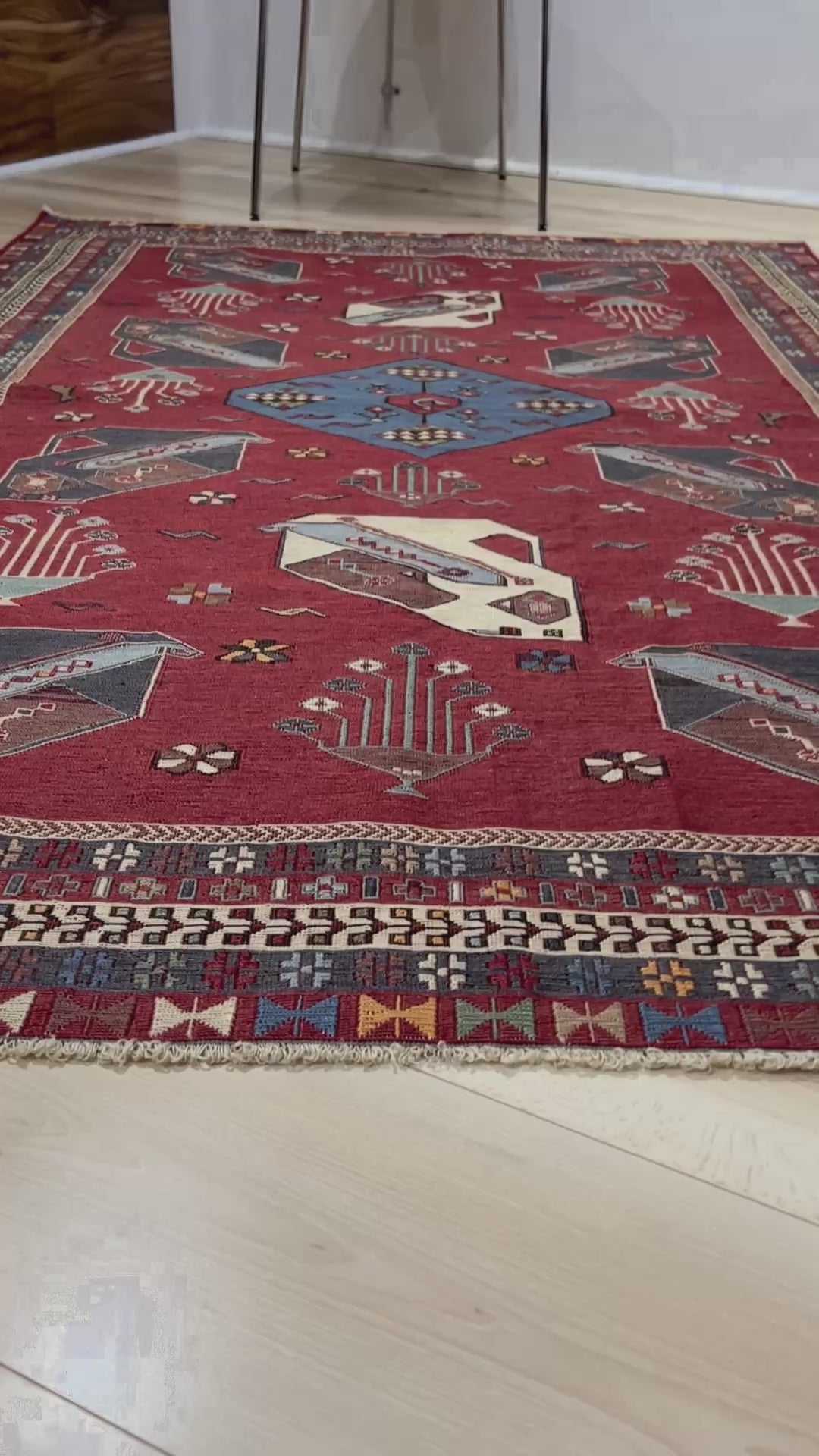 Vintage Armenian soumak rug with pictorial motifs in madder red, slate blue, ivory, and charcoal, 4x6 size.