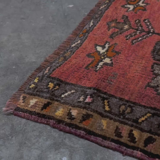 Vintage Turkish Yastik rug with a terracotta field, olive-brown medallions. Hand-knotted wool, 24x34 inches. Perfect accent  mini rug kitchen, entry, bathroom, study.  One-of-a-kind rug from Indigo Rugs in Burlingame, the best rug shop in the San Francisco Bay Area. Free shipping included.