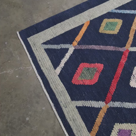 Modern Vibrant Turkish Tulu handmade wool a geometric patterned area rug 9x12 from Indigo Rugs Burlingame Bay Area.