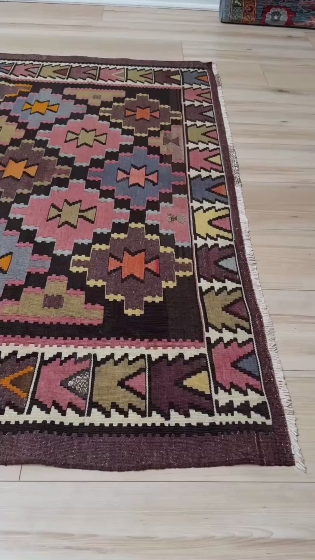 Multicolored vintage Caucasian kilim runner in charcoal plum with stepped diamond geometric design and Nazar motif, handwoven wool flatweave rug, approx. 5x9.