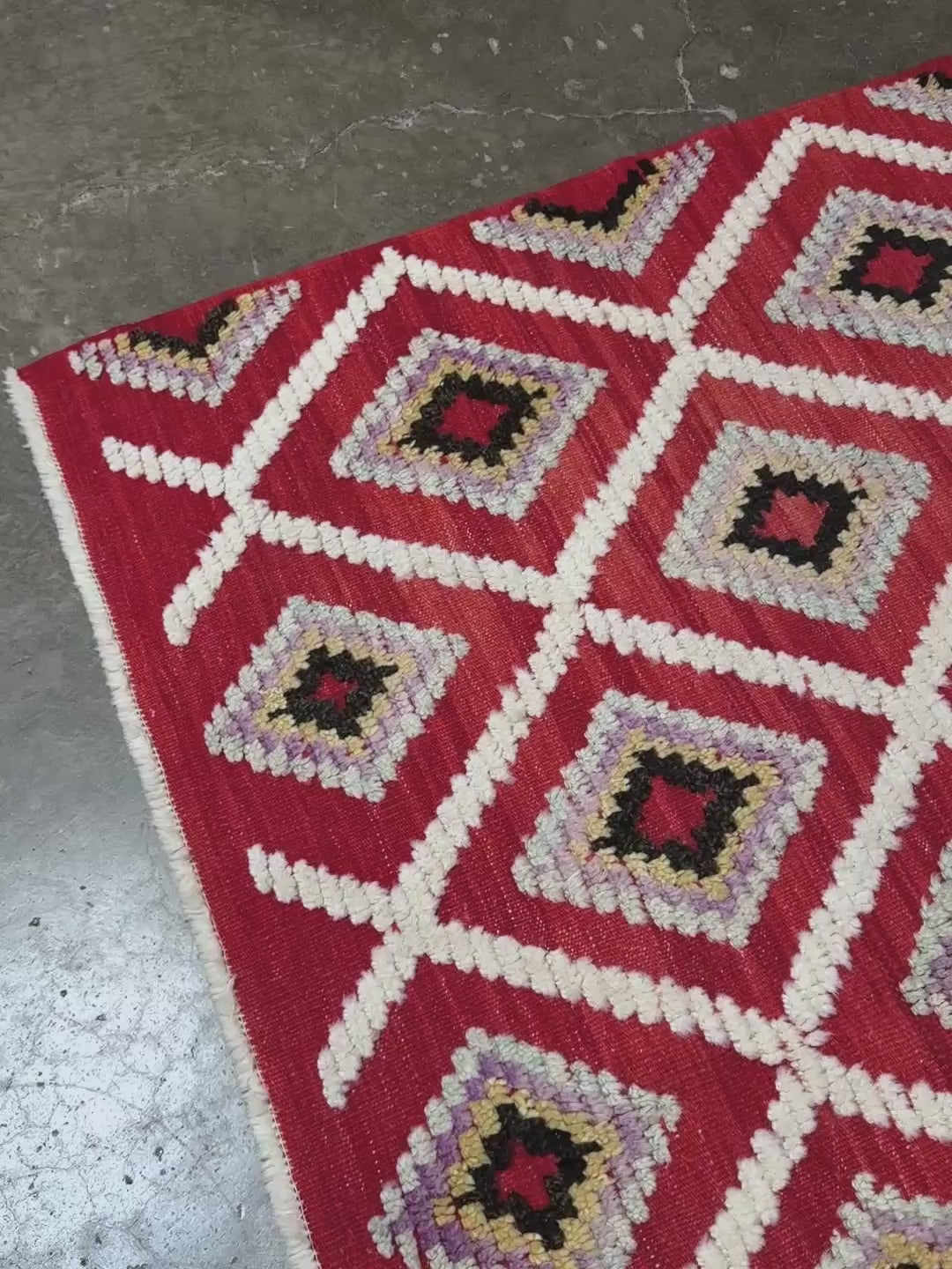 Red Turkish Tulu rug with ivory diamond lattice, raised wool texture, lavender, gray-blue, accents, 6x9 handmade moroccan style area rug from Indigo Rugs Burlingame Bay Area.