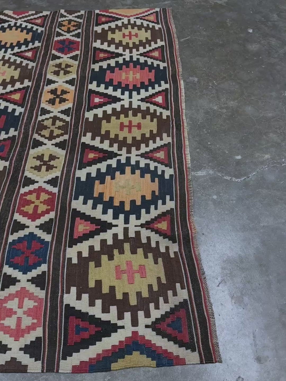 Vintage Caucasian Kazak tribal kilim rug with geometric medallions in beige, red, blue, and brown — handmade flatweave 5x8